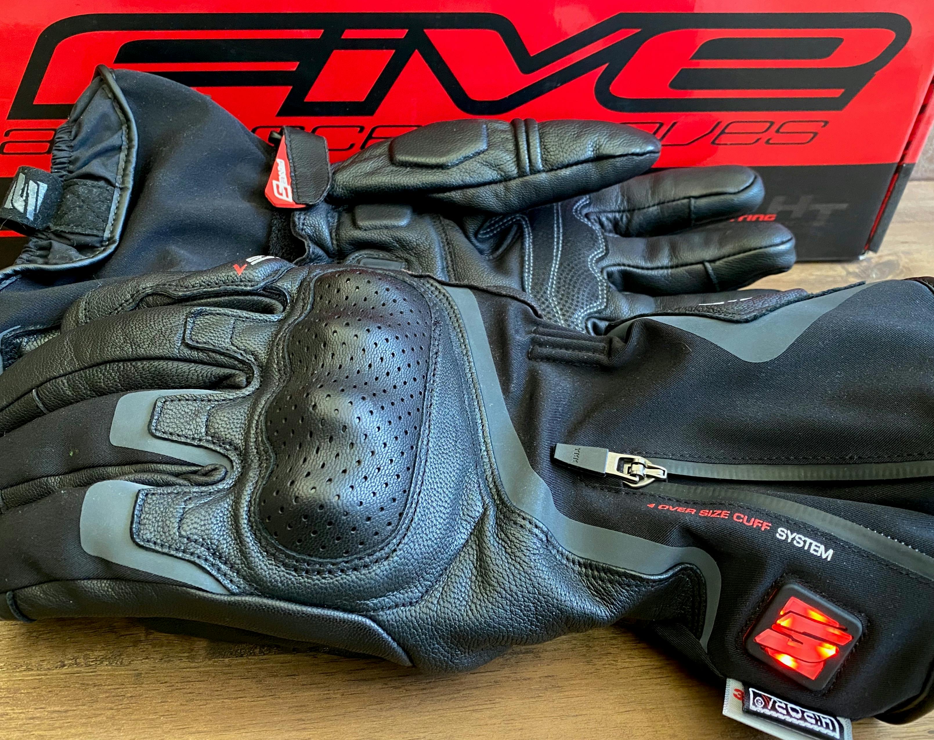 A pair of Five HG-1 gloves in front of their red box