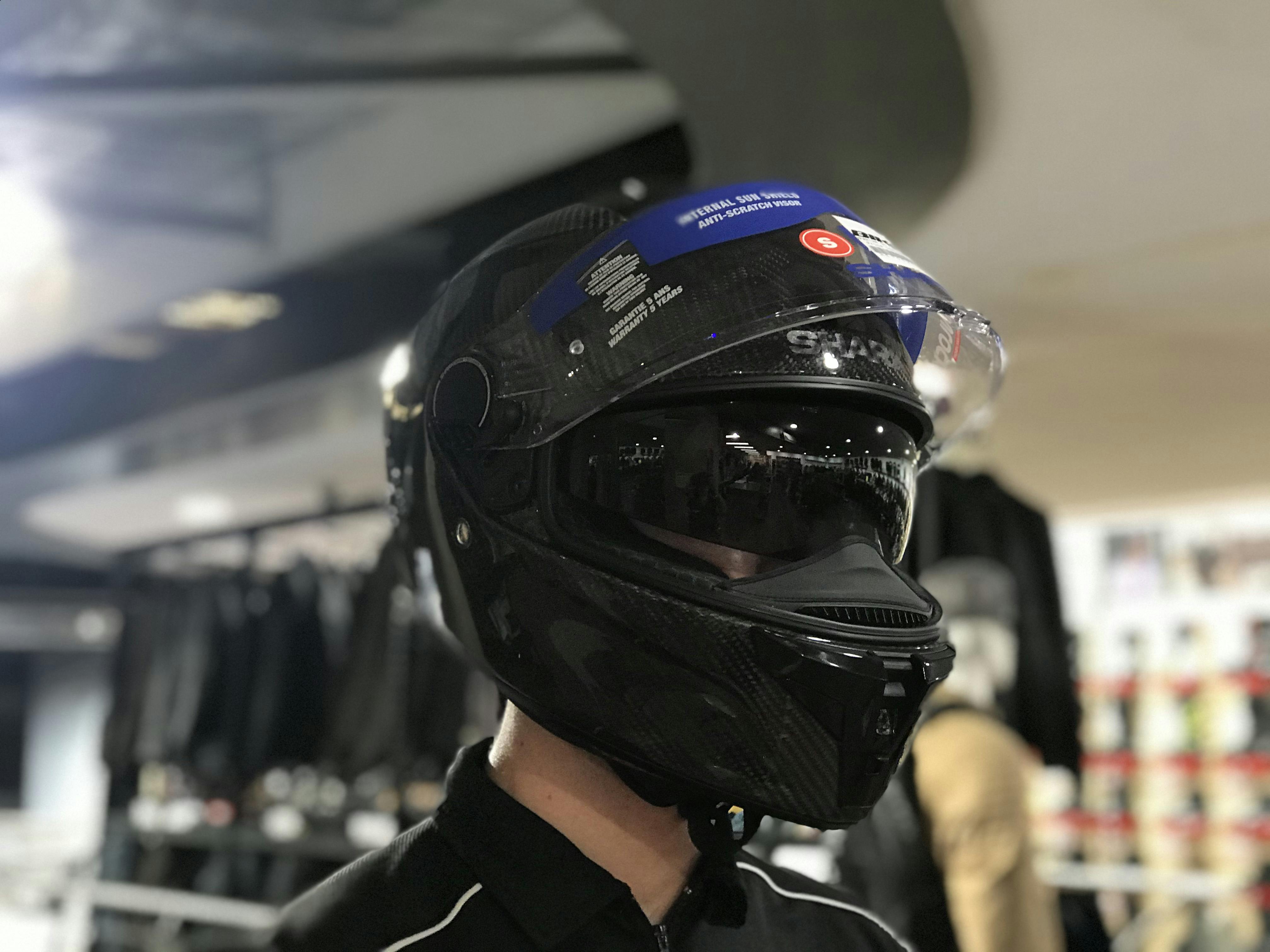 Sam in a full face helmet carbon skin