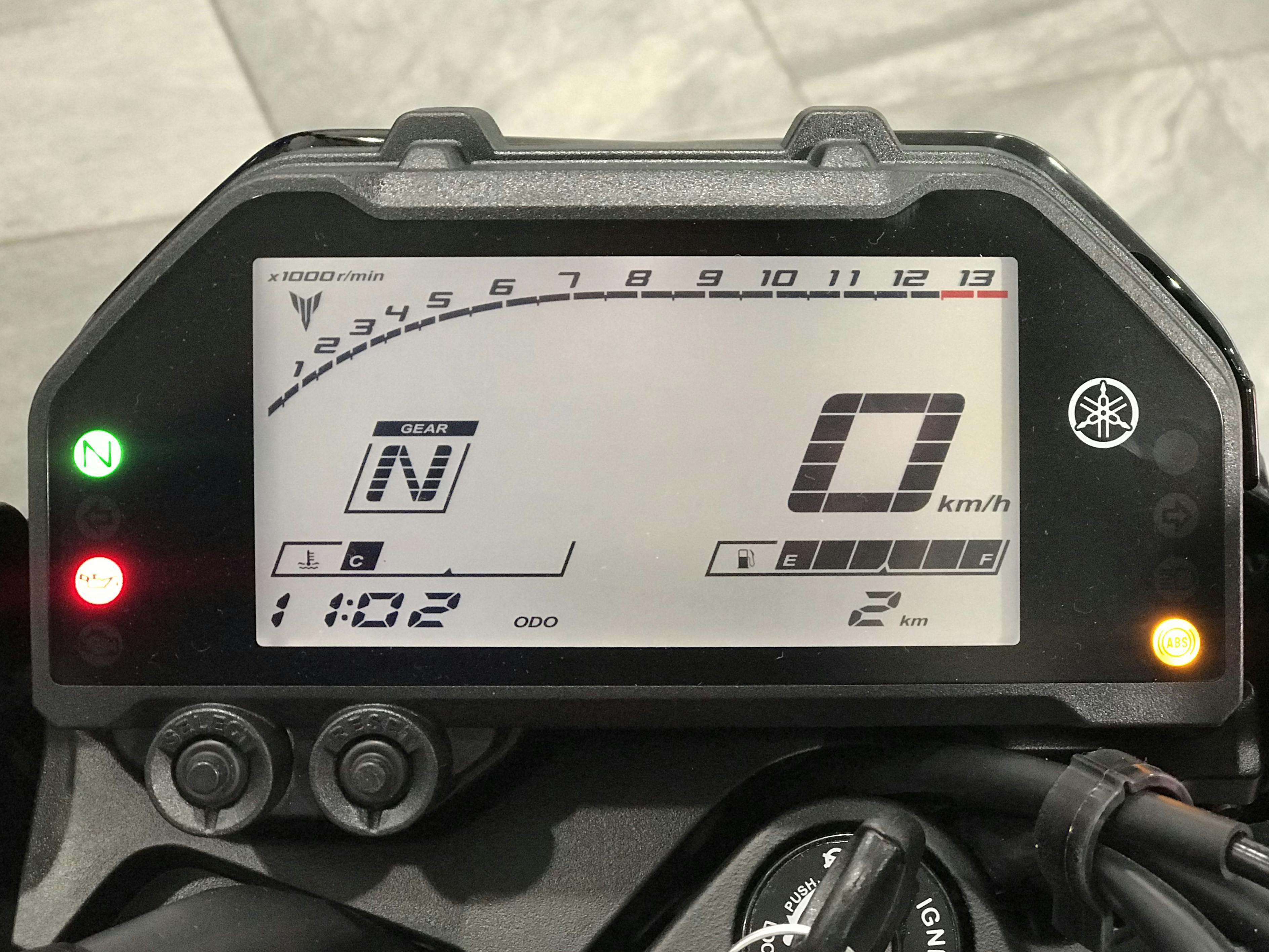 A close up of the dash of the Yamaha MT03
