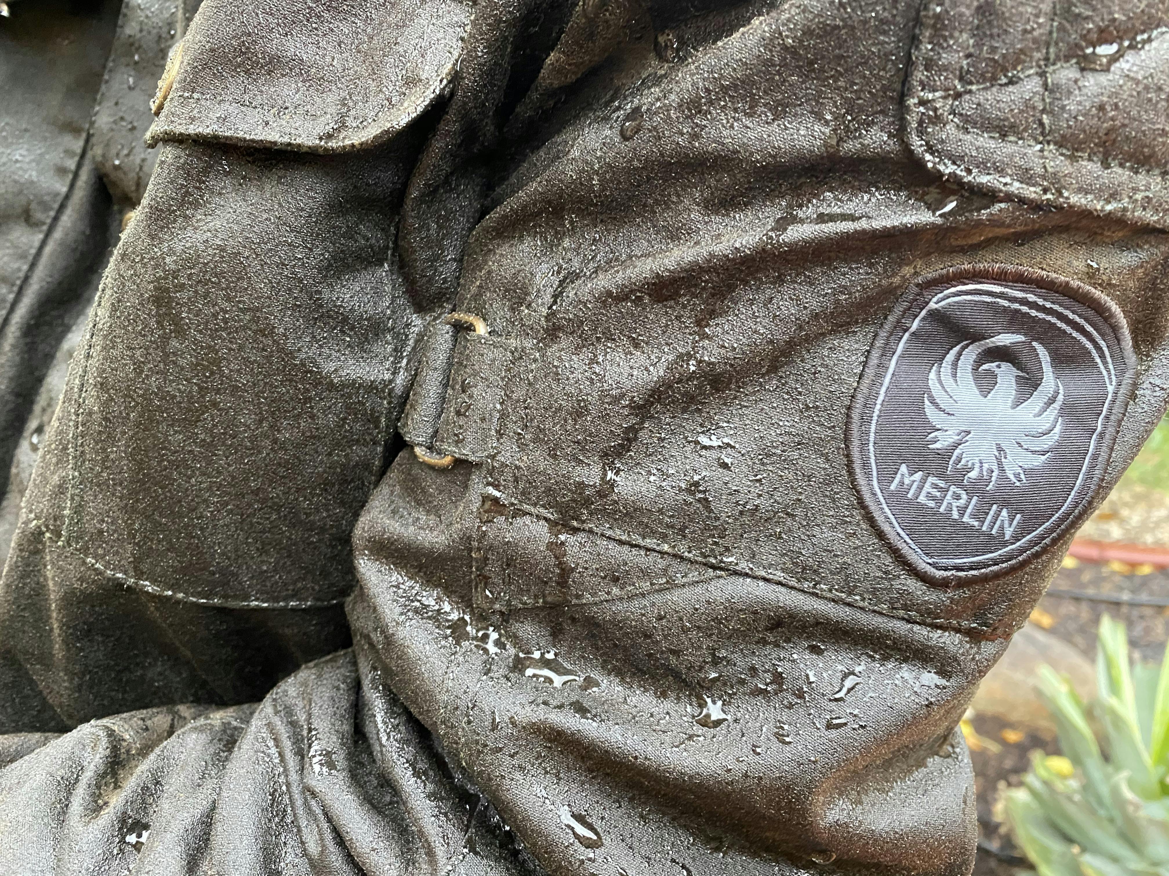 A close up of a wet arm of the Merlin Barton Jacket