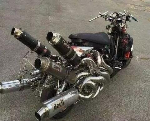 5 exhaust mufflers on a motorcycle