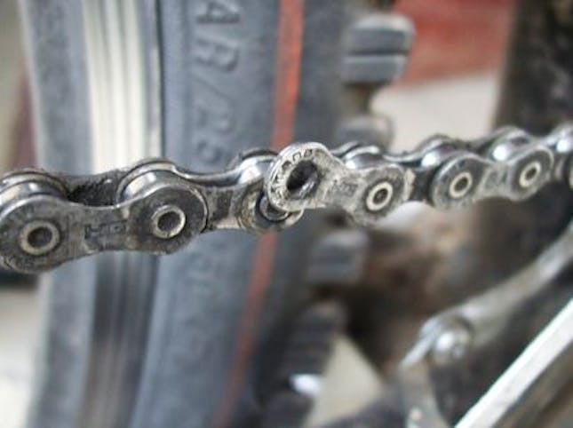 A half broken bike chain link