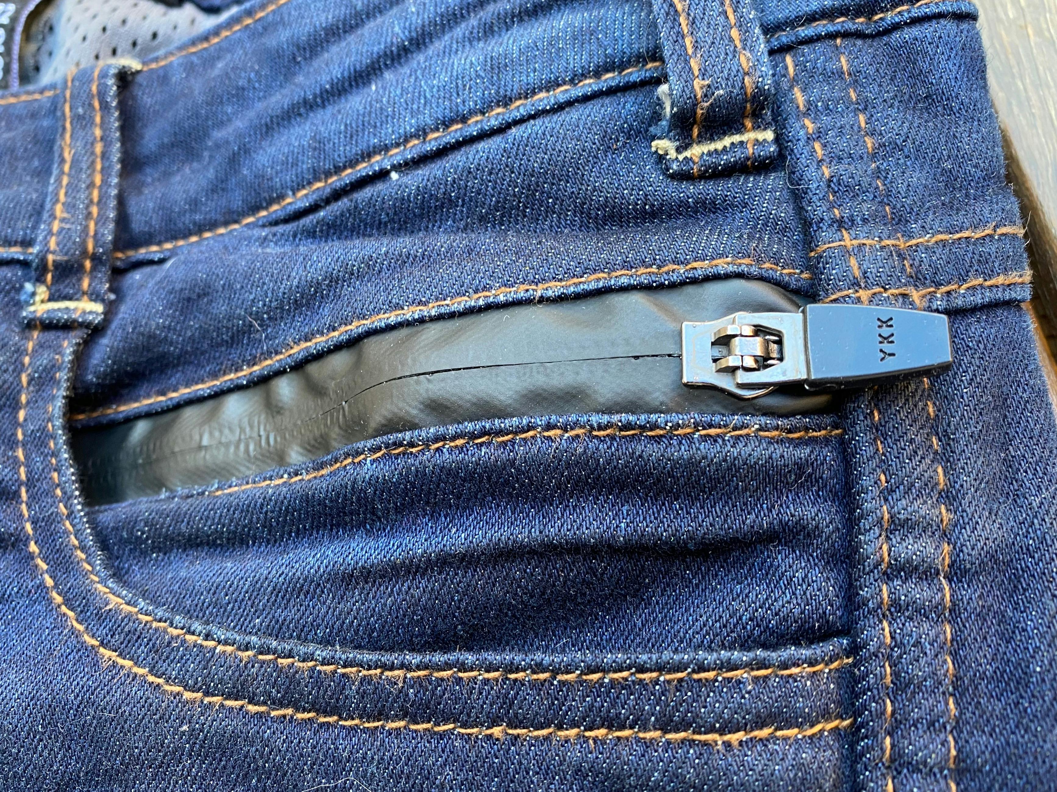 One of the YKK zips on a pair of blue merlin mason jeans