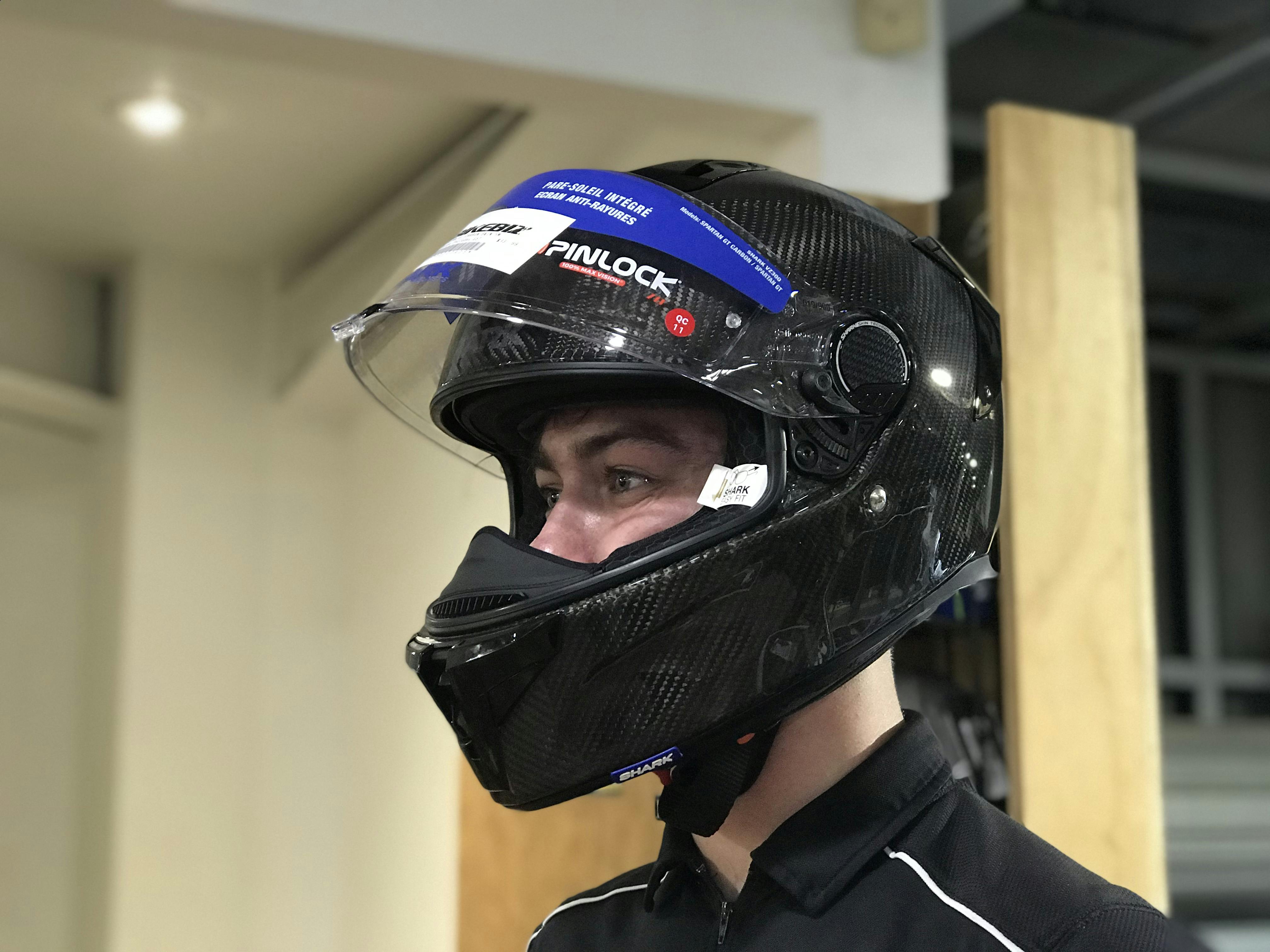 Sam in a full face helmet carbon skin