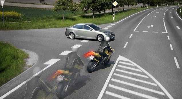 A car pulling out in front of a motorcycle