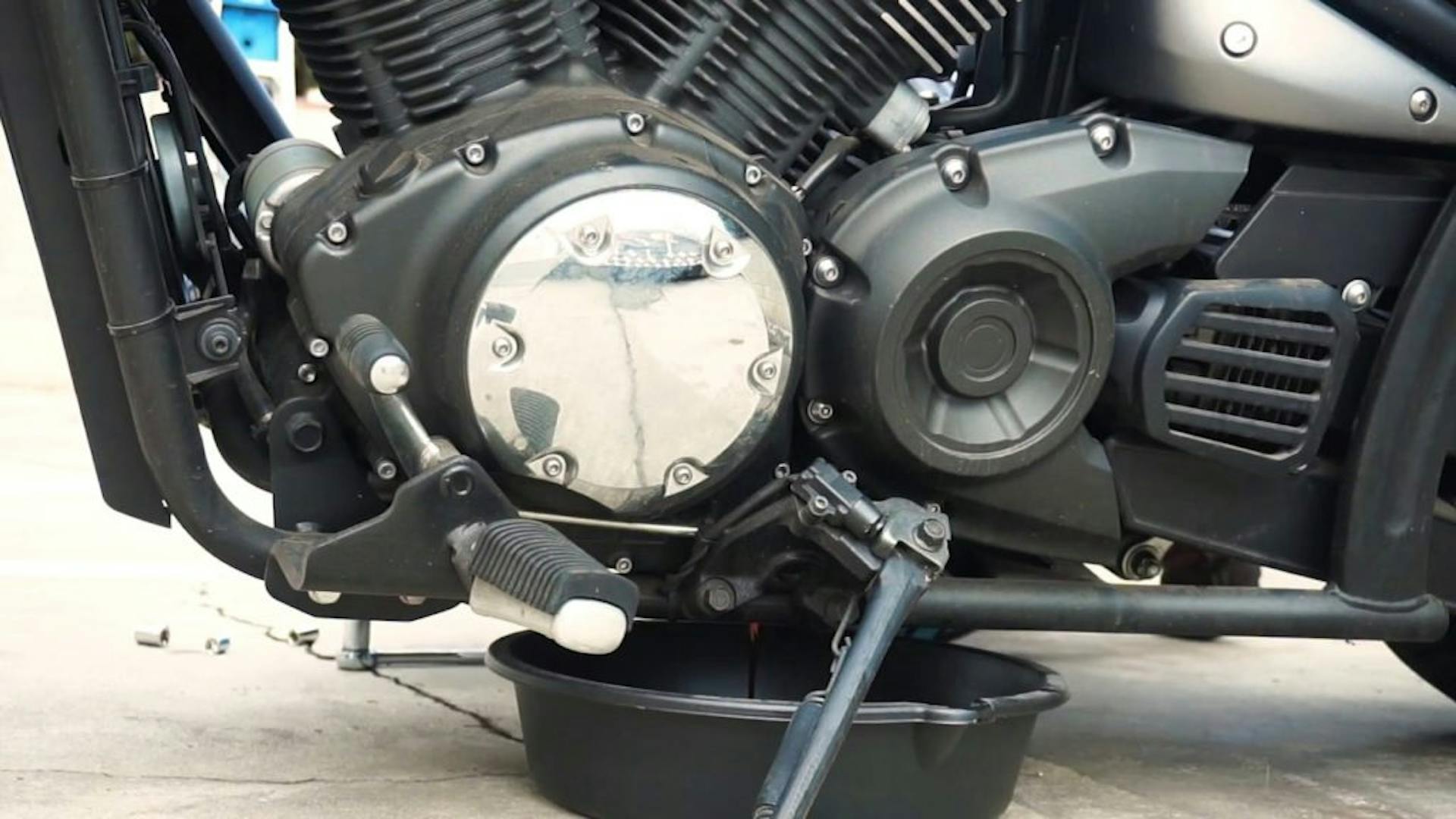 Oil pan under a motorcycle