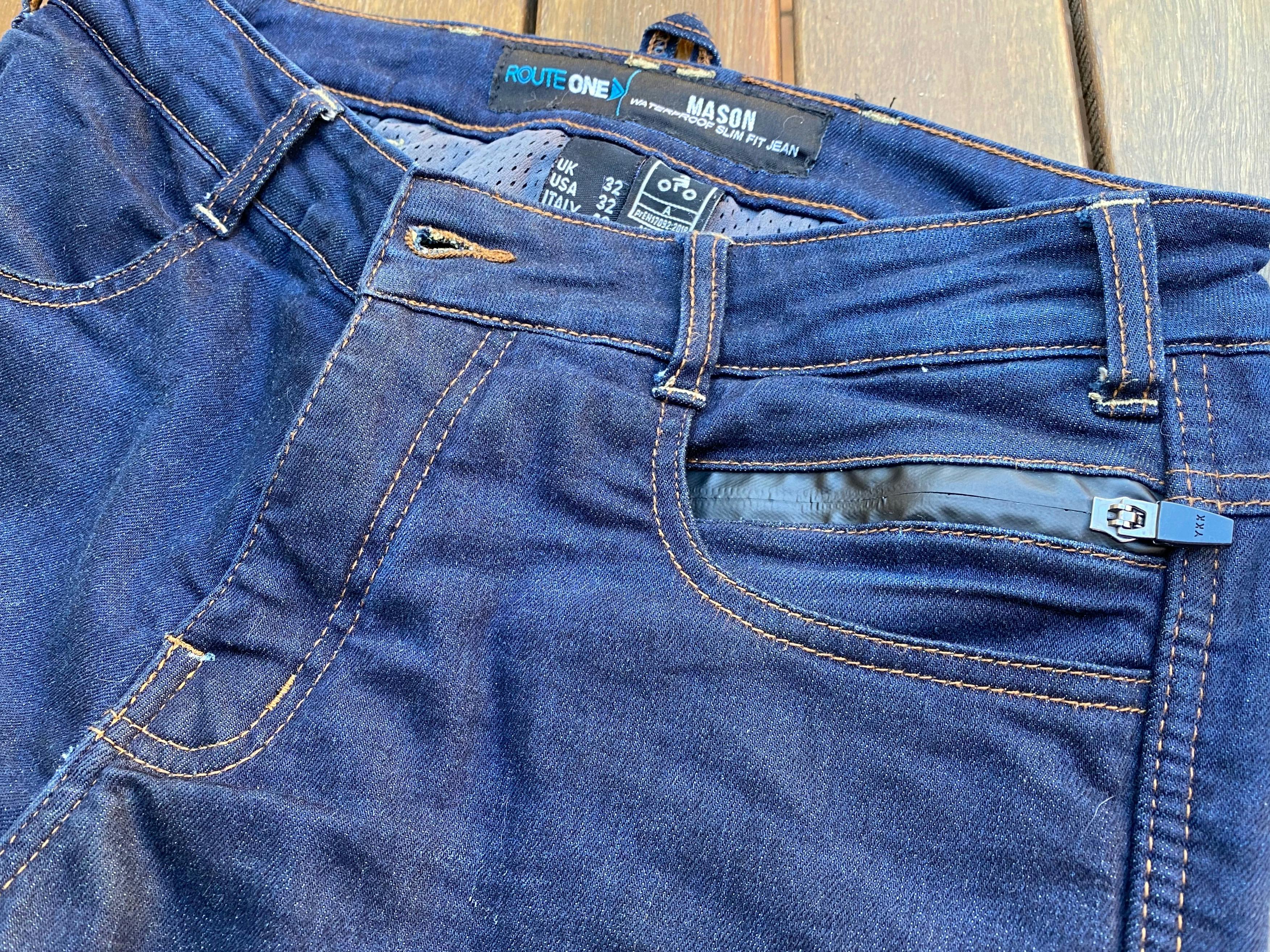Heat welded tape to create a waterproof pocket on the front of a pair of blue merlin mason jeans