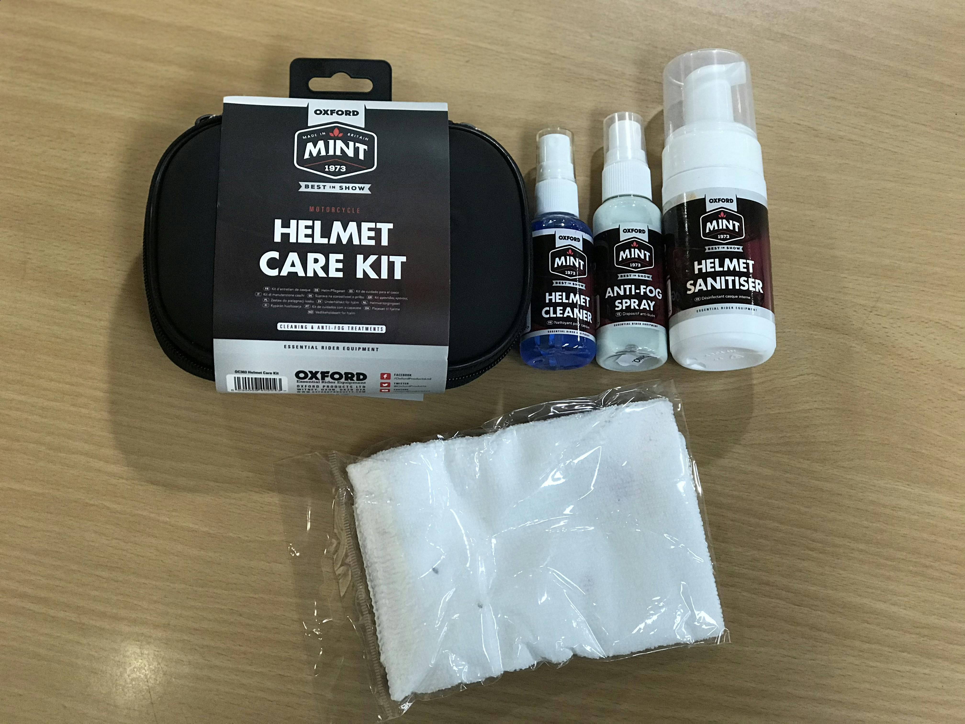 A Mint helmet care kit laid out