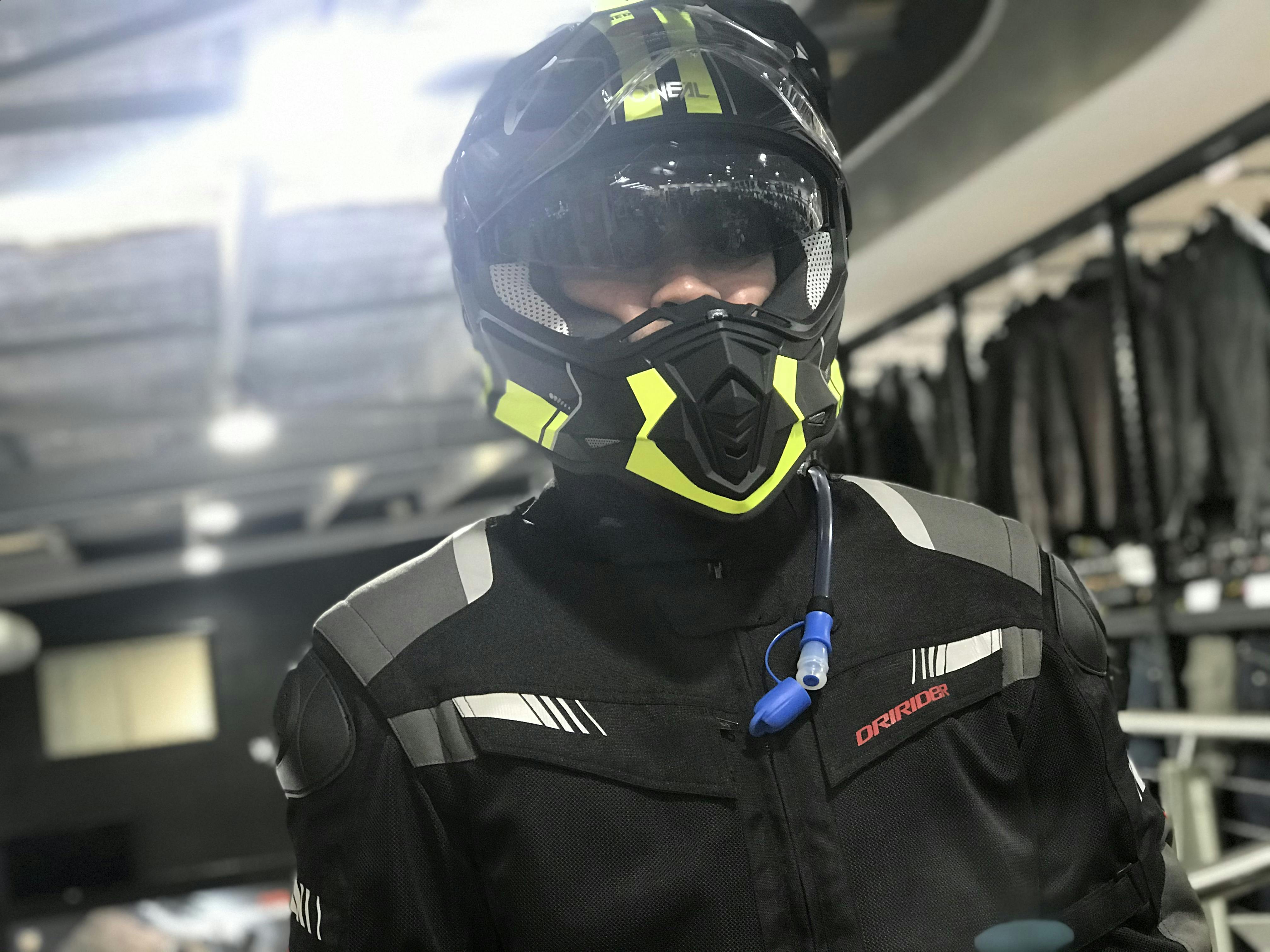 James in a black and yellow dual sport helmet 