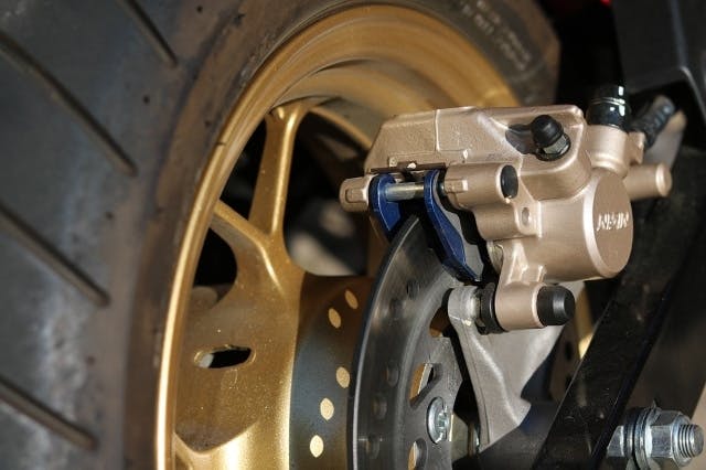 The rear brake on a motorcycle