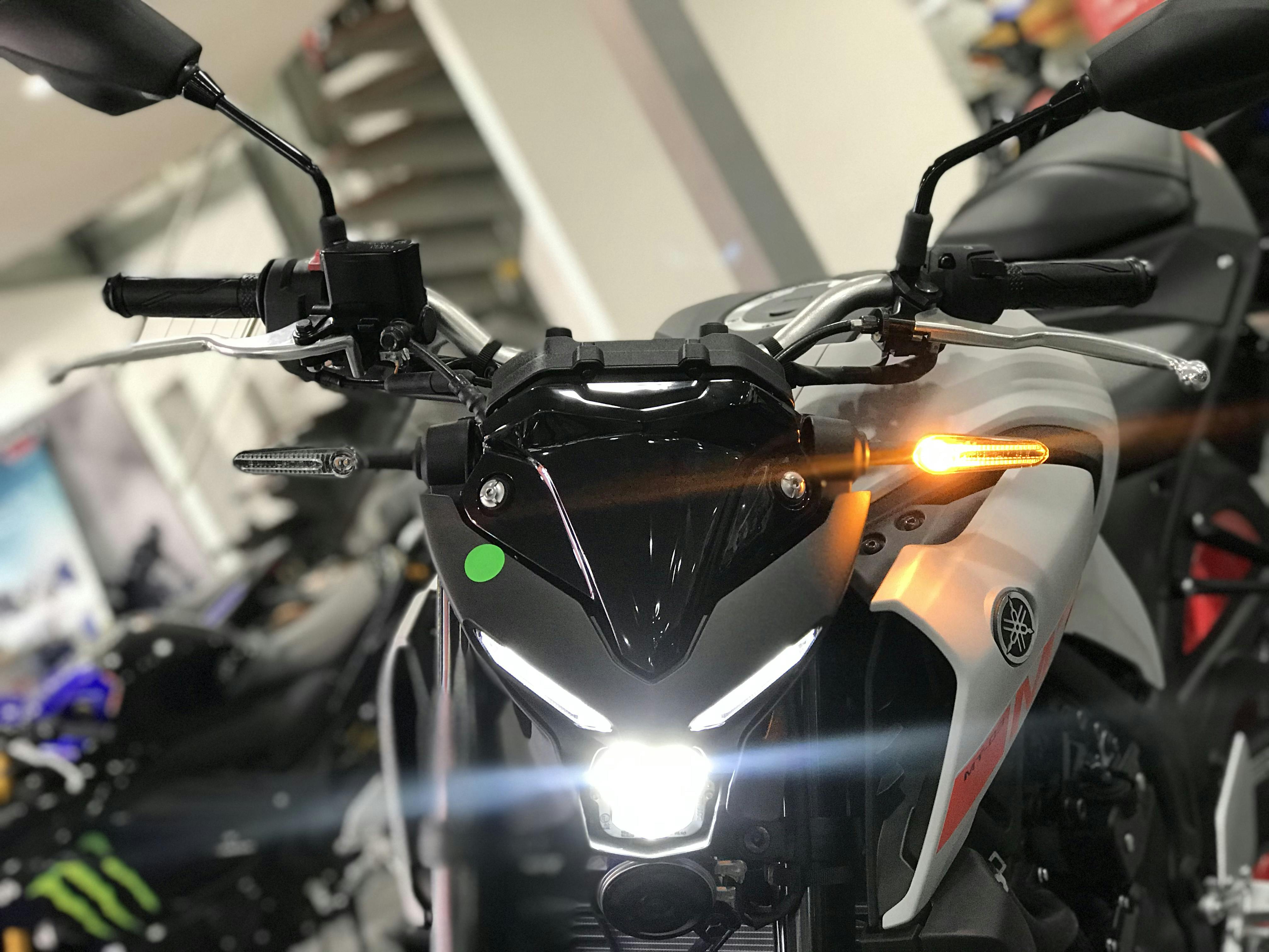 A close up of the headlights on the 2020 Yamaha MT03