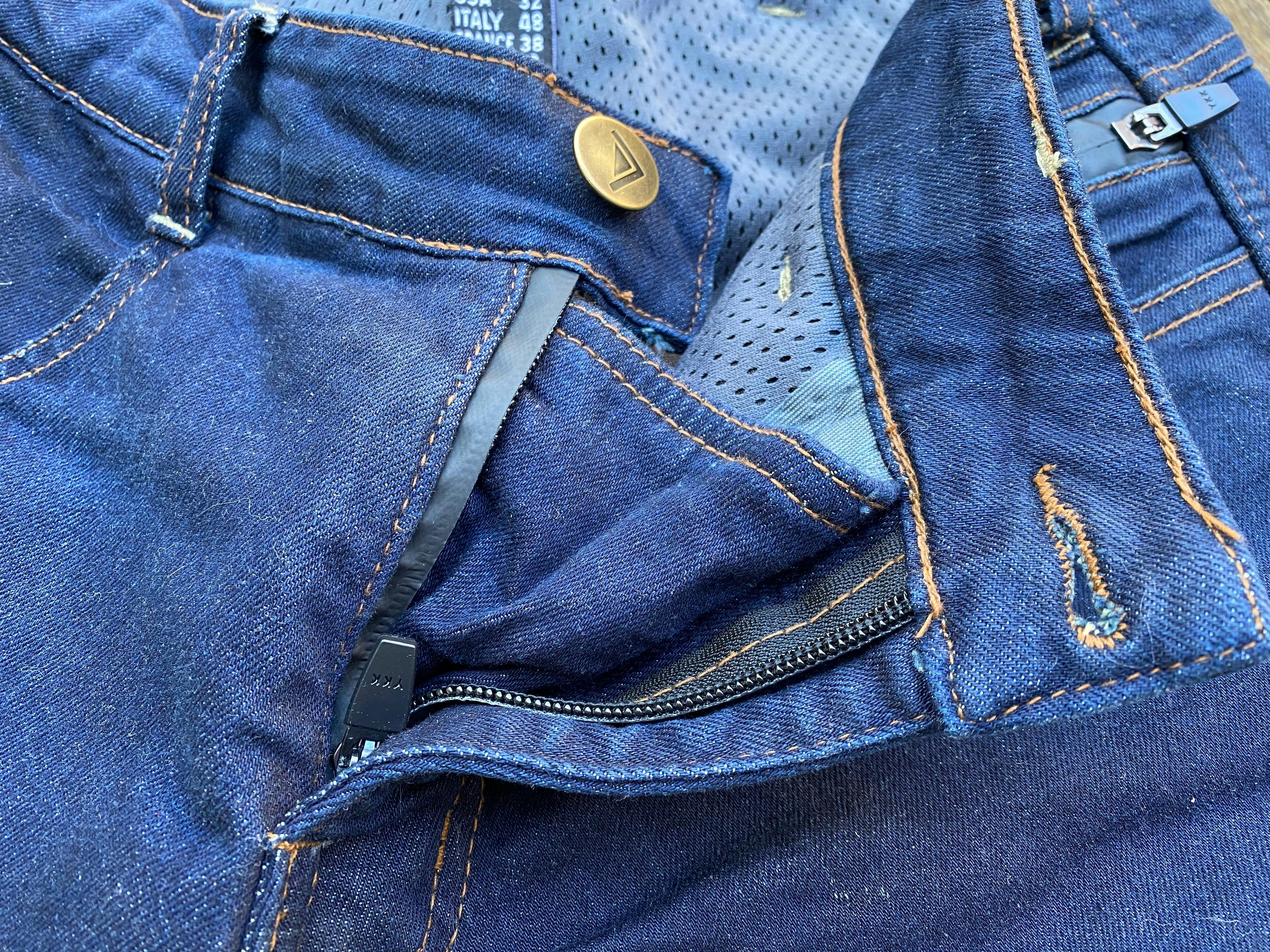 Heat welded tape to create a waterproof zip on a pair of blue merlin jeans