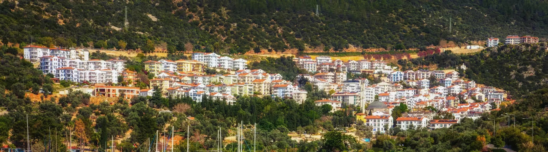 Kaş'ın denize bakan beyaz evleri, İzmir Antalya otobüs bileti kapak görseli