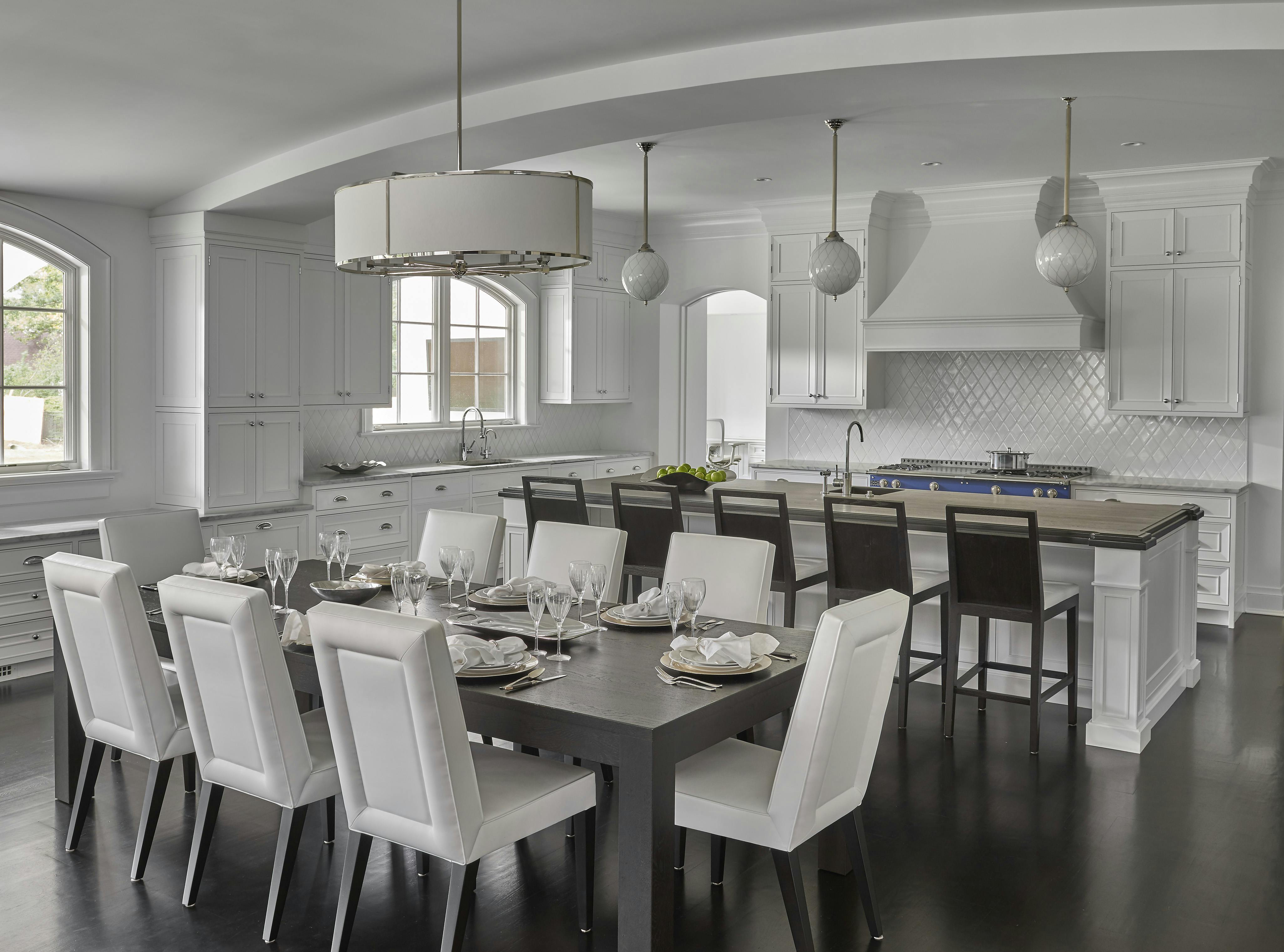 Kitchen with an open-concept layout and unique lighting fixtures