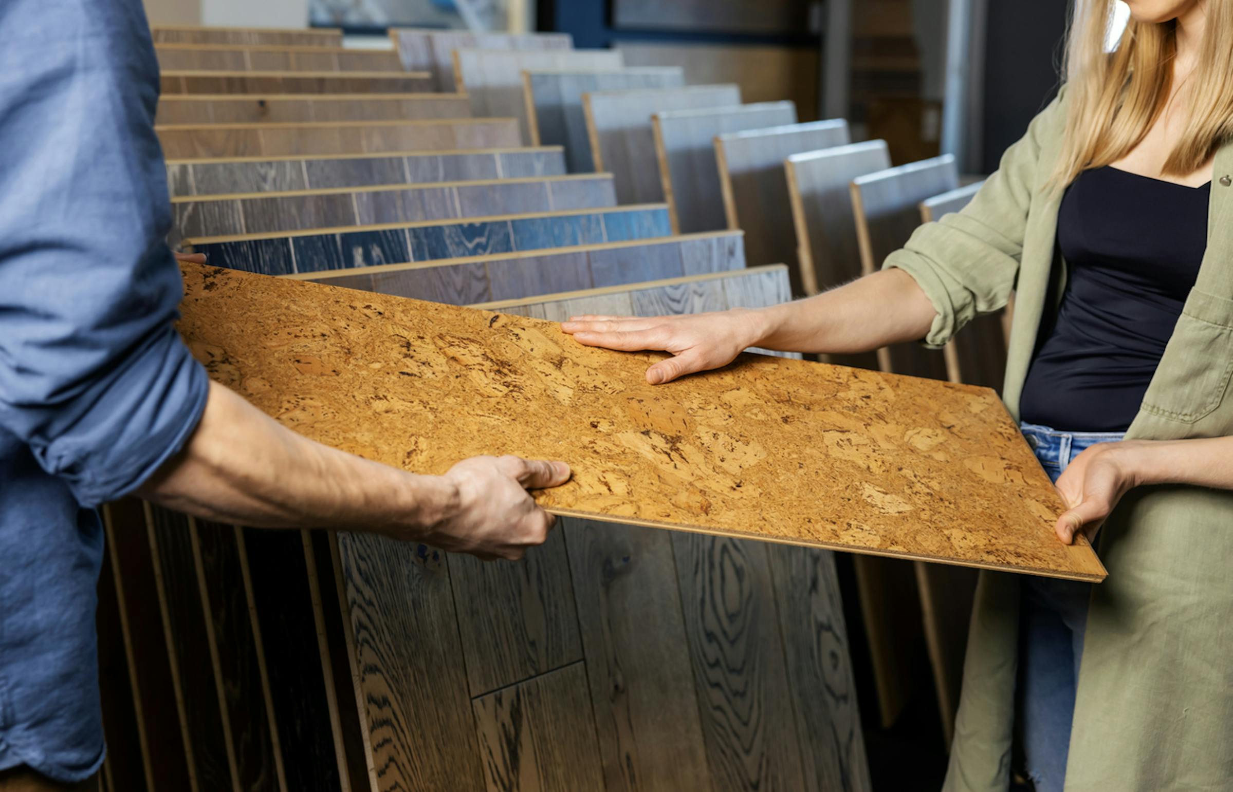 Replacing your flooring Couple picking out cork flooring