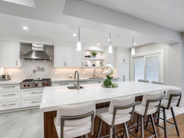Modern kitchen with a dark wood finish on the island