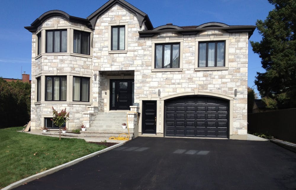 Paving by Excellent Pavage Freshly paved driveway