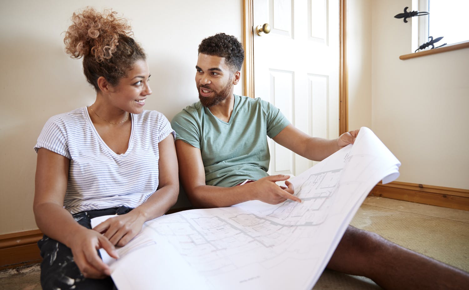 Couple planning a home renovation Couple planning a home renovation