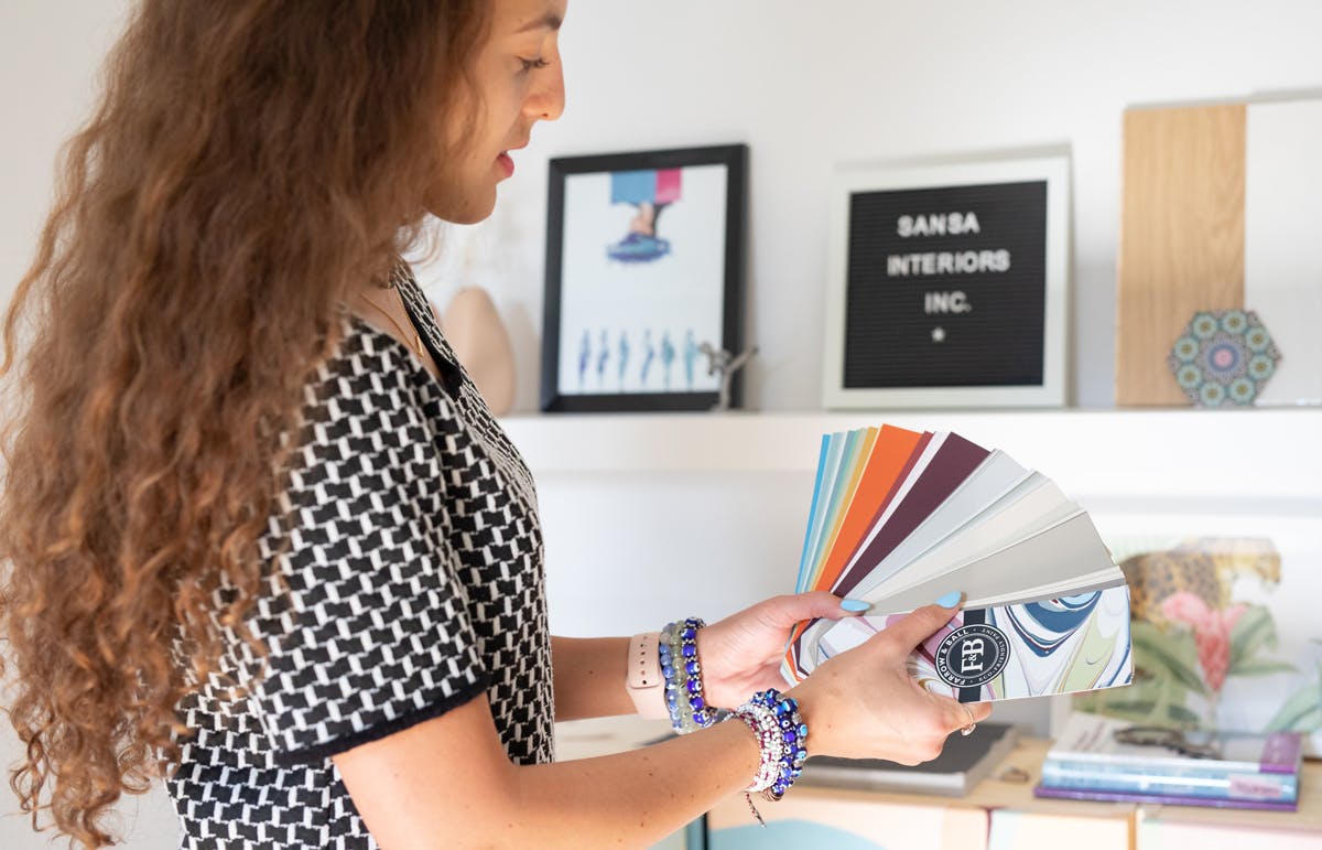 Jude Kamal selecting colors Jude Kamal, interior designer and founder of Sansa Interiors selecting colors