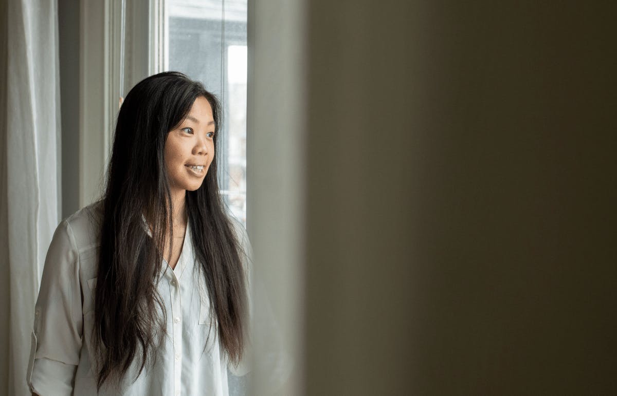 Victoria Suen, architect, looking out her window Victoria Suen, architect, looking out her window