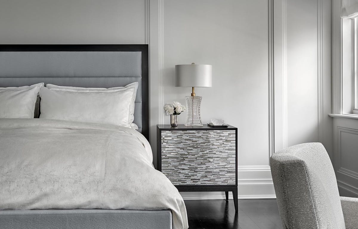 Carpets out, hardwood floors in Bedroom with hardwood floors