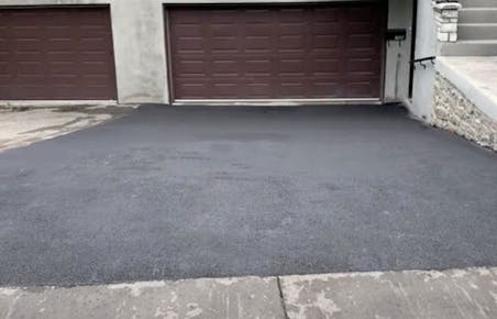 Freshly paved driveway Freshly paved driveway