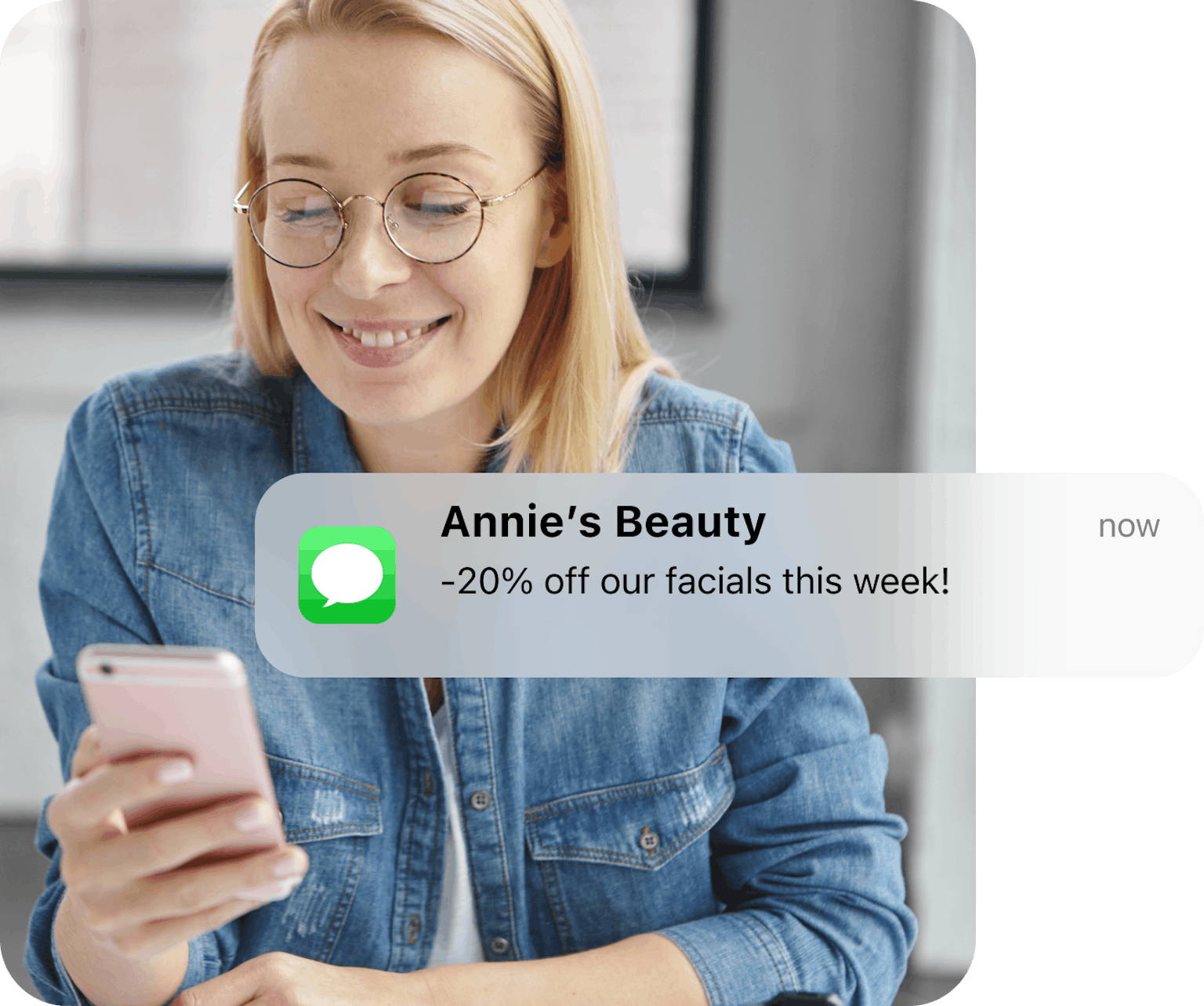 Client at a beauty & wellness salon receiving a marketing SMS on their phone