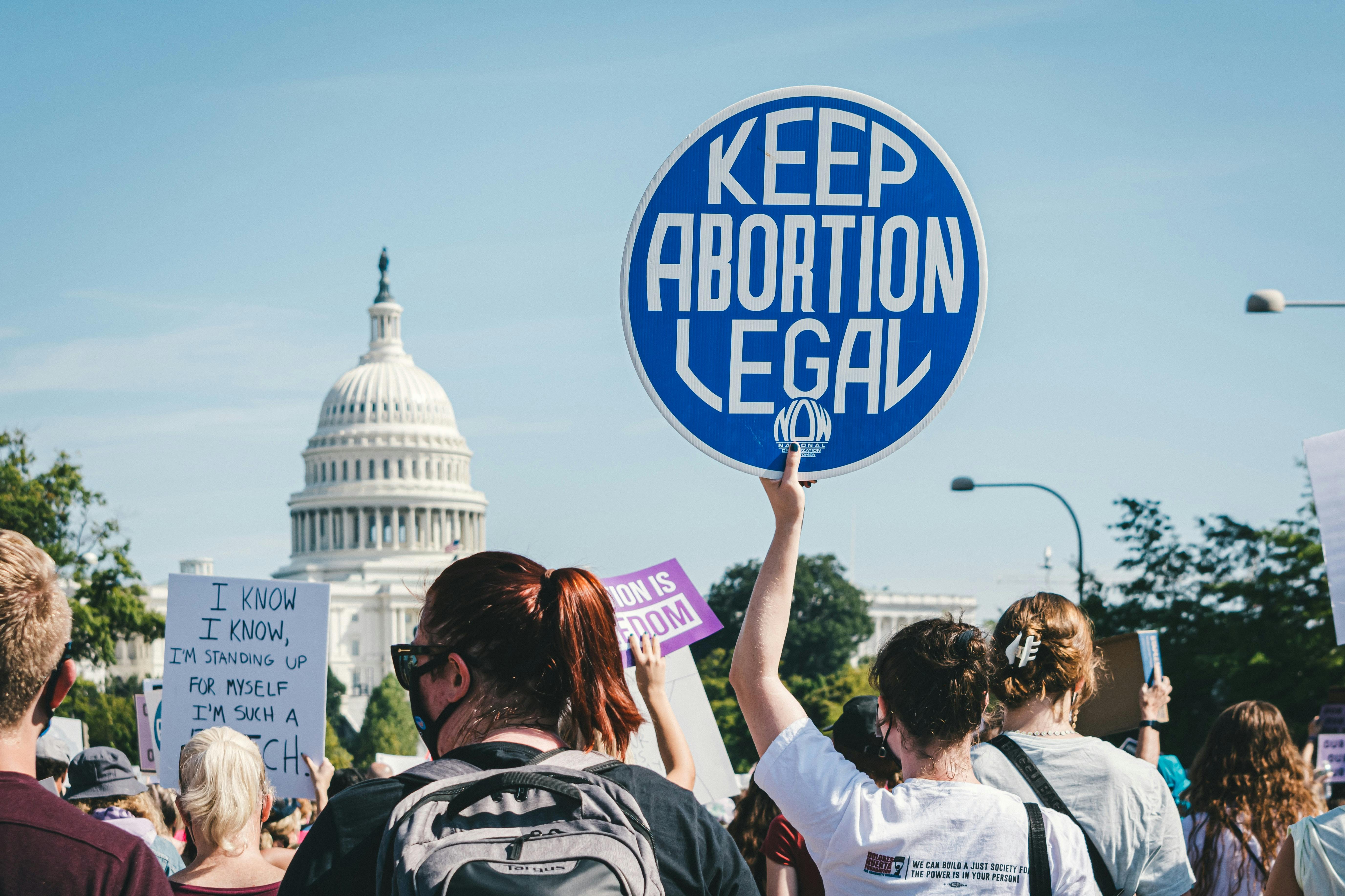 sign saying keep abortion legal - Photo by Gayatri Malhotra on Unsplash