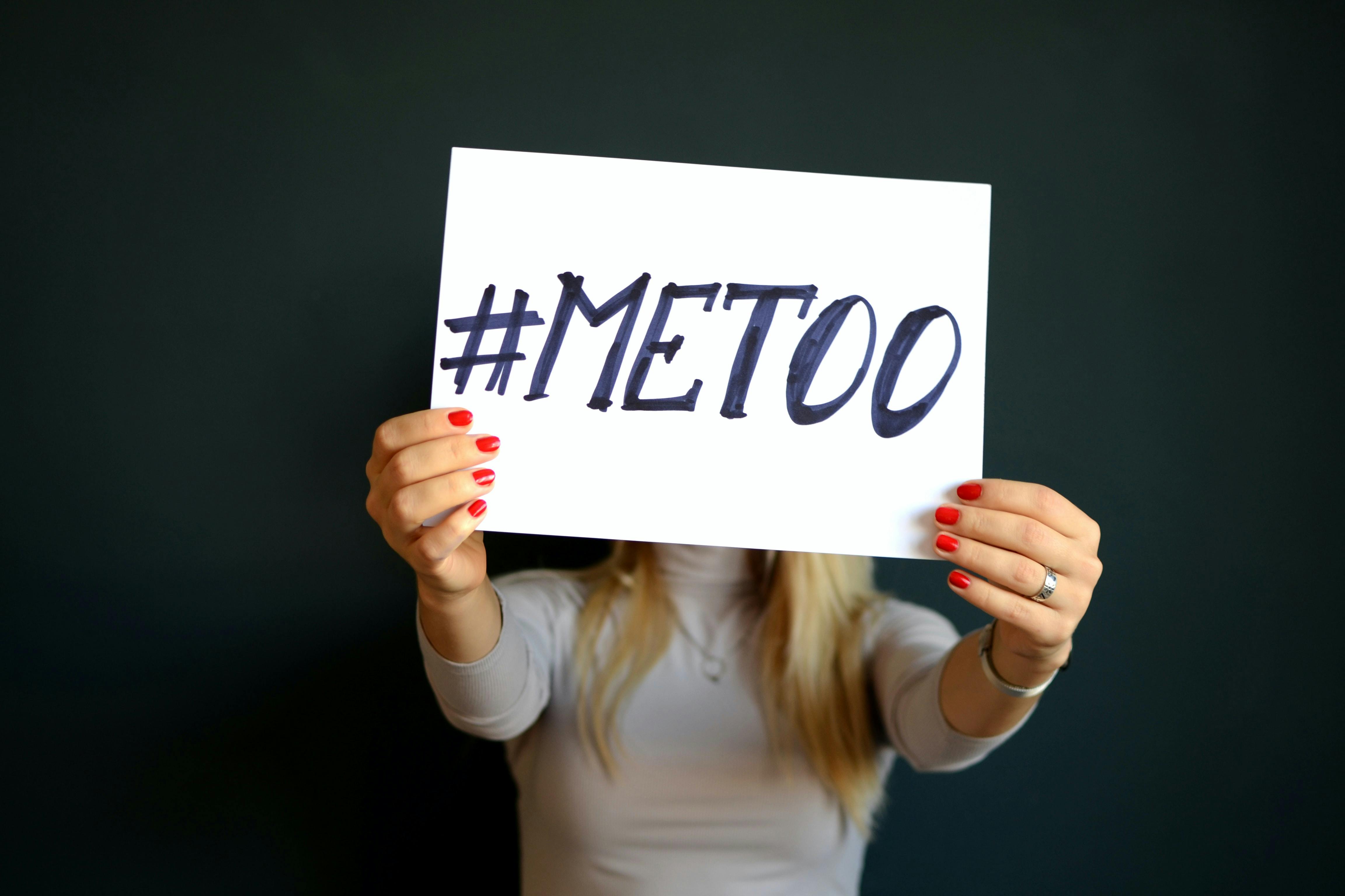 woman holding #MeToo sign - Photo by Mihai Surdu on Unsplash