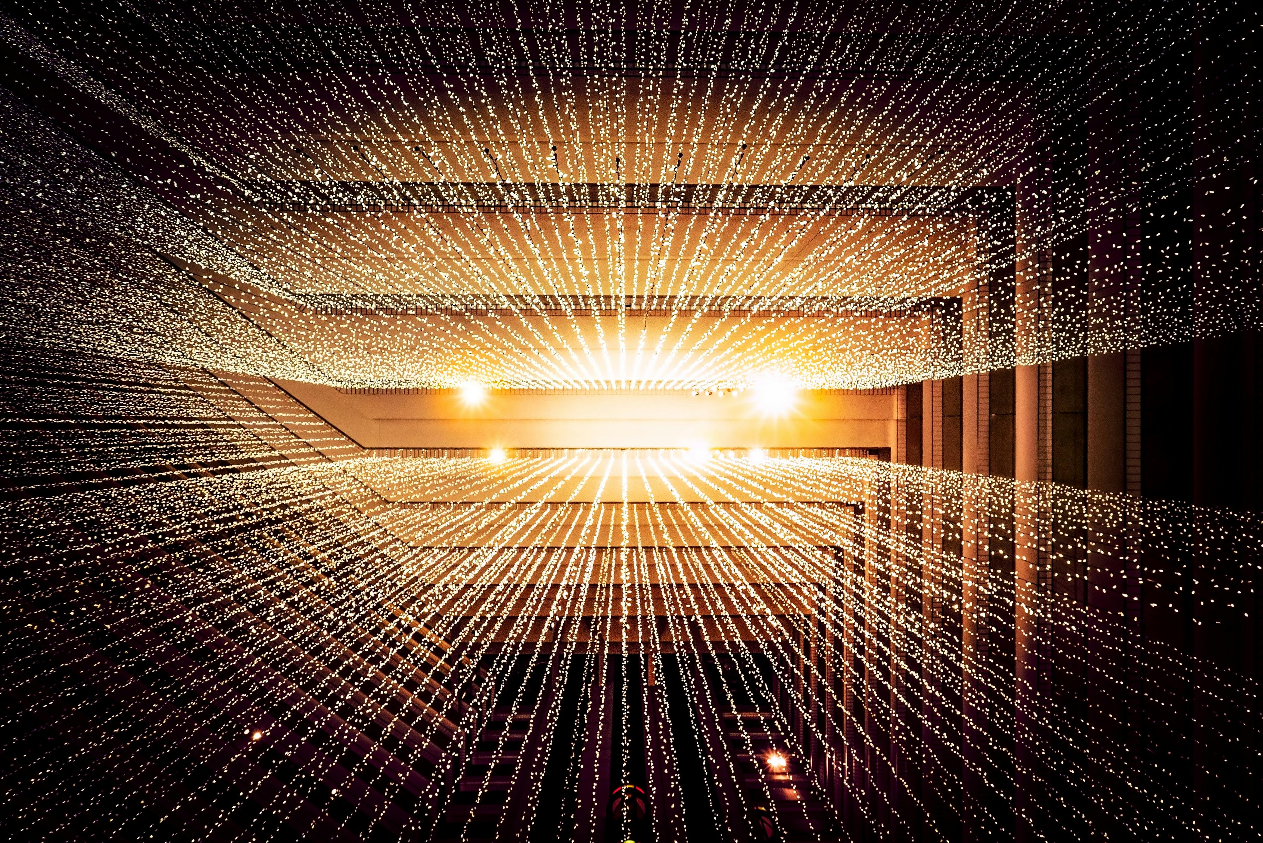 lights going through a room like computer data - Photo by Joshua Sortino on Unsplash