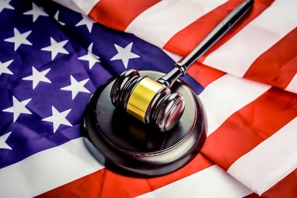 A gavel on an American flag