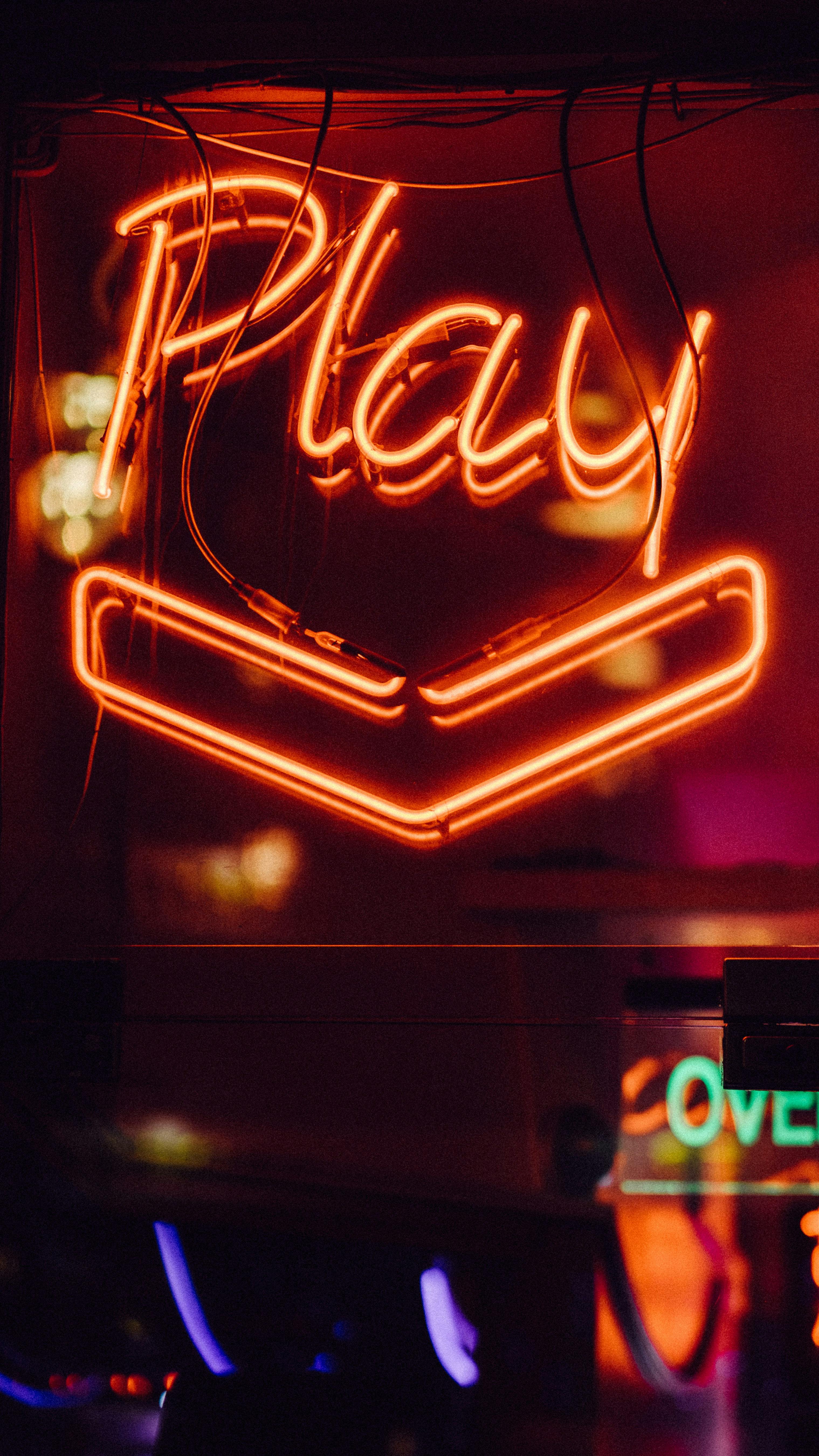 play neon sign - Photo by Clem Onojeghuo on Unsplash

