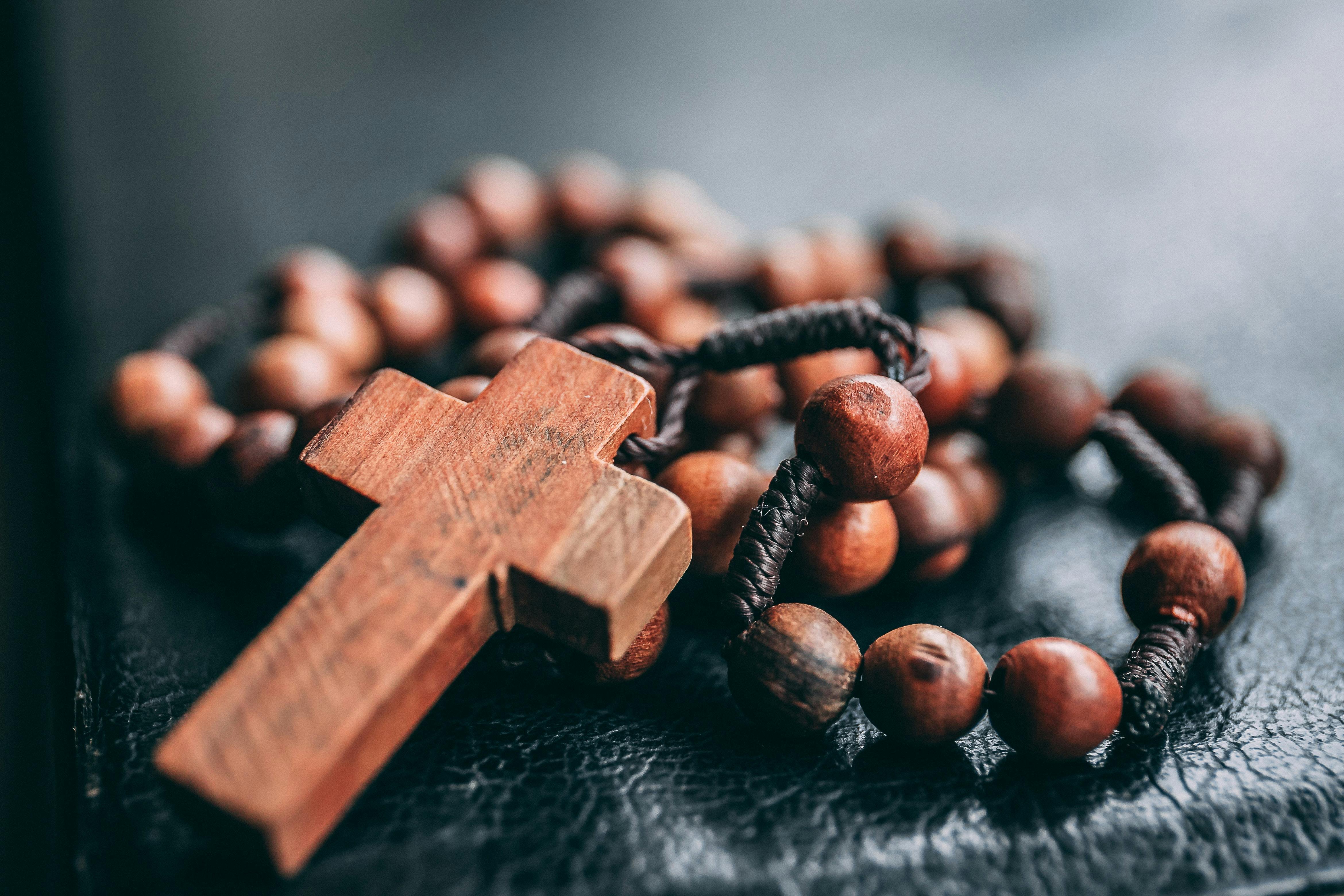 wooden rosary - Photo by James Coleman on Unsplash