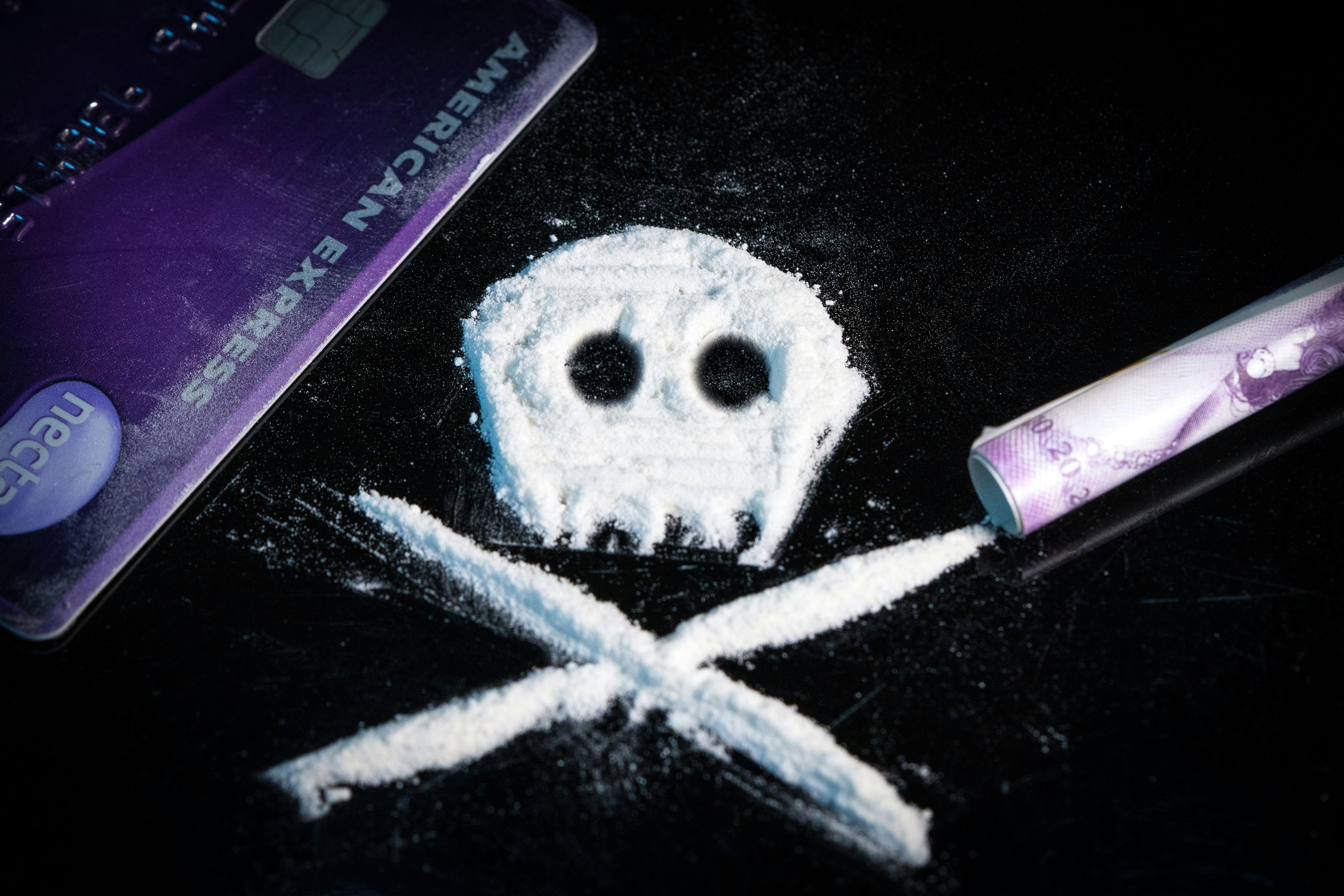 drugs with death symbol - Photo by Colin Davis on Unsplash