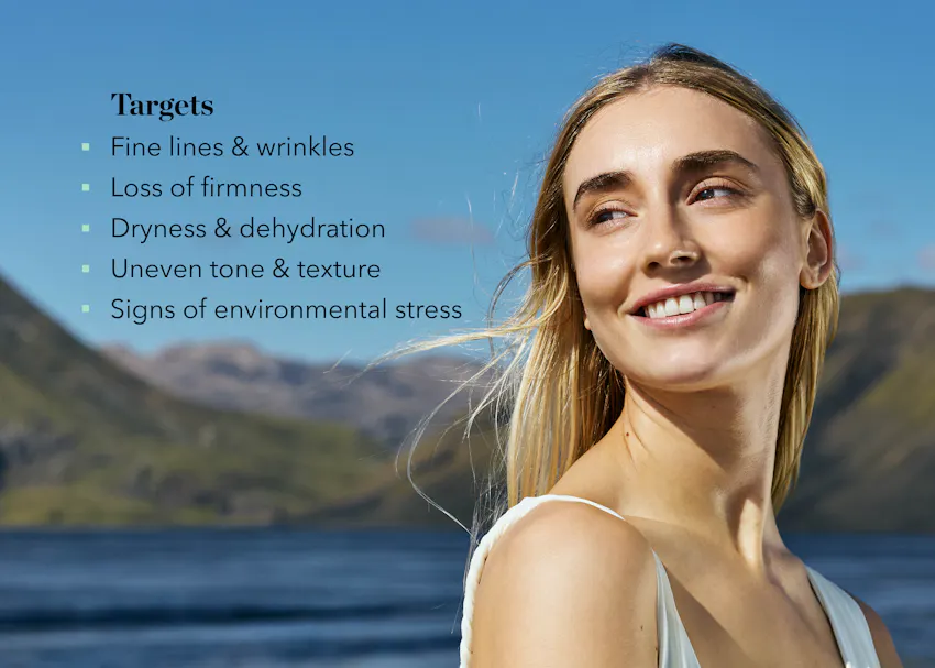 Woman with healthy-looking skin outdoors in Icelandic landscape, highlighting EGF Day Serum benefits for fine lines, loss of firmness, dryness, uneven texture, and environmental stress