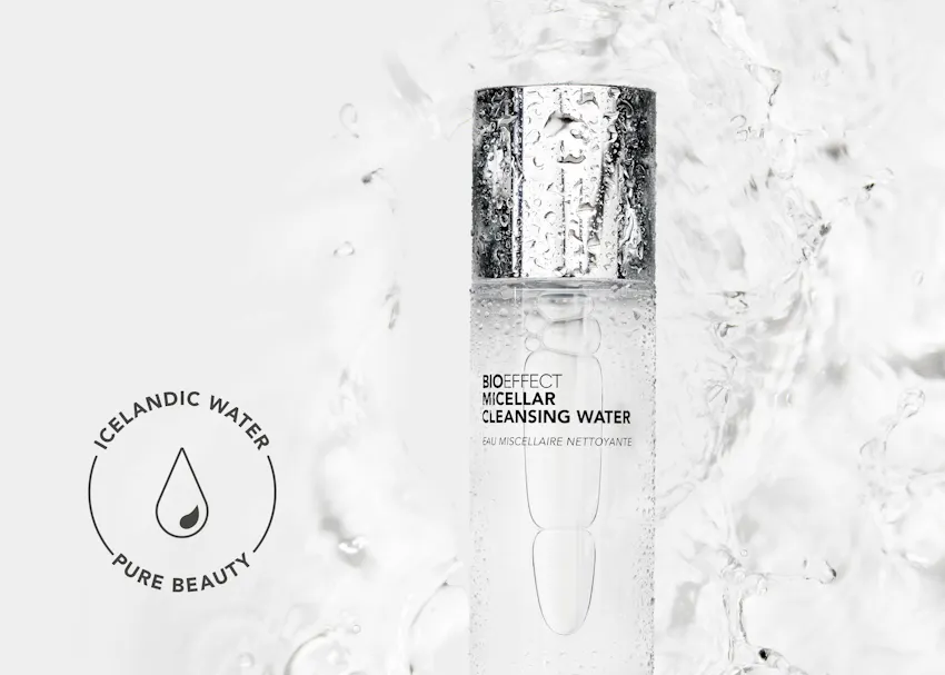 BIOEFFECT Micellar Cleansing Water surrounded by splashing water, emphasizing its formulation with pure Icelandic water and refreshing, gentle cleansing properties.