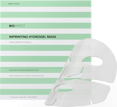 Green-and-white striped, square-shaped package of BIOEFFECT Pure Skin Care Imprinting Hydrogel Face Mask with a clear mask to the right of the package.