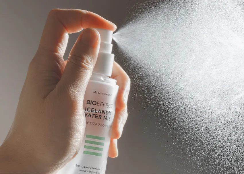 Close-up of BIOEFFECT Icelandic Water Mist being sprayed, showing a fine mist designed to instantly hydrate, refresh, and revitalize the skin throughout the day.