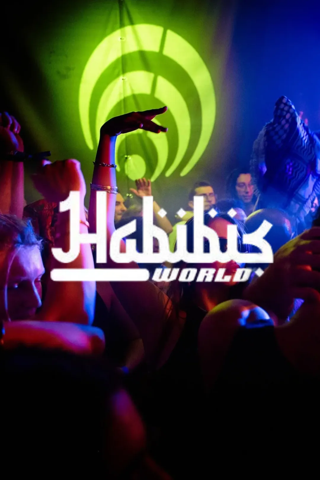 People dancing in the club, with the logo of Habibi's World