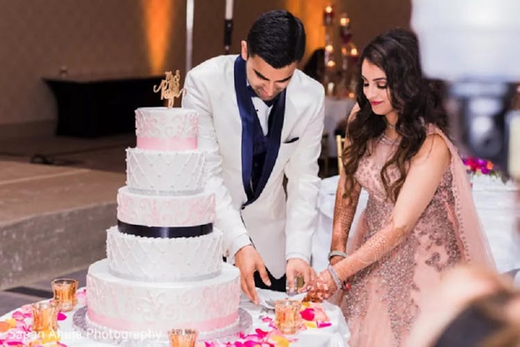 cake cutting ceremony in christian wedding