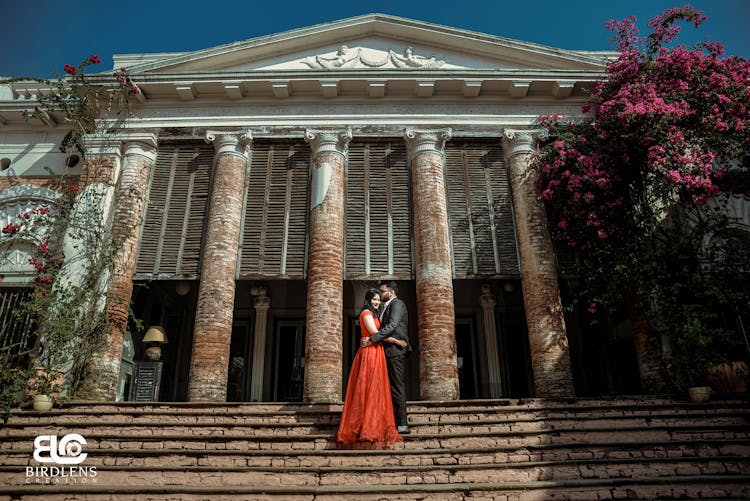 couple pose for wedding photography