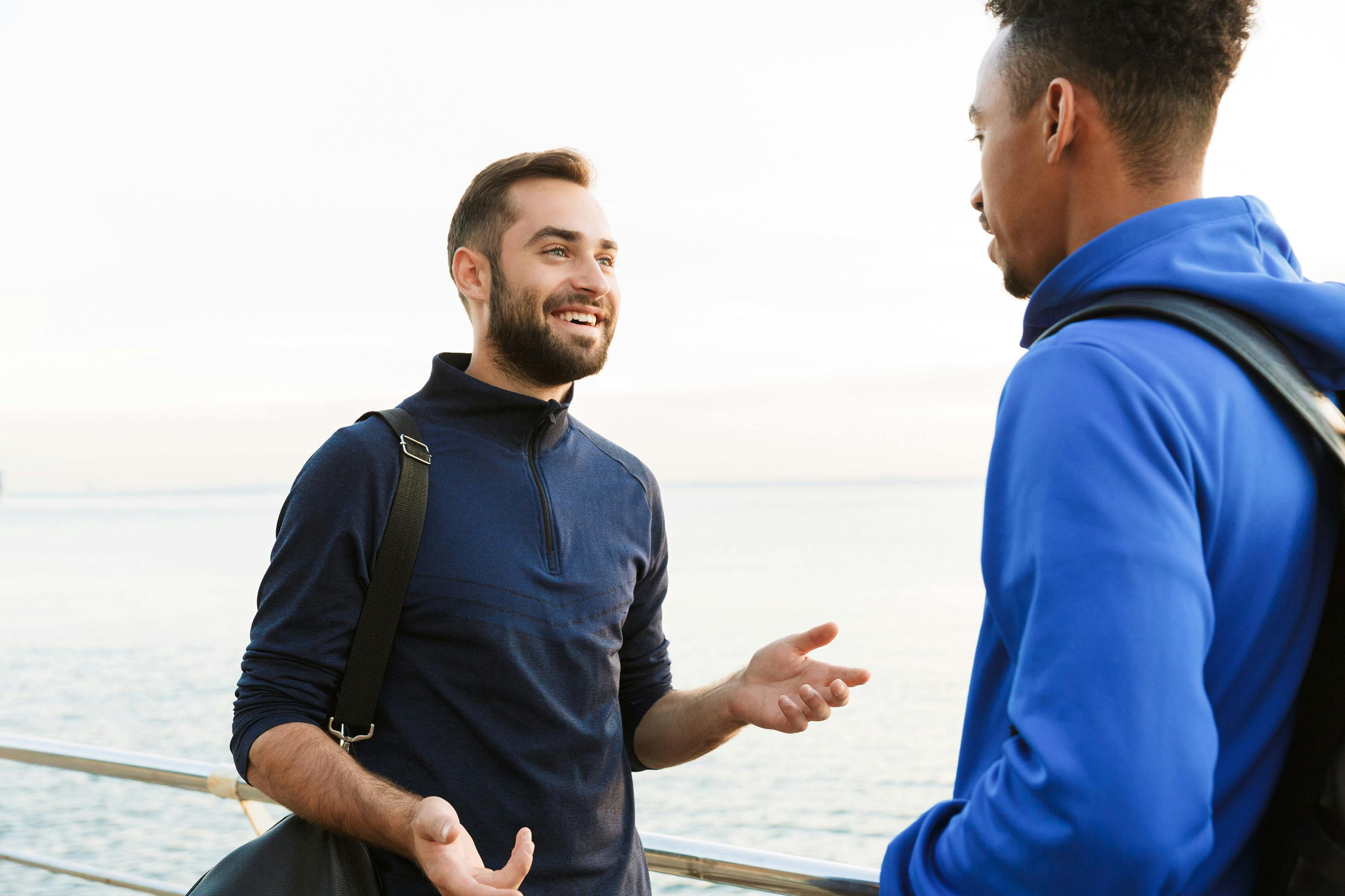 two people talking representing how to improve communication with hearing impairment