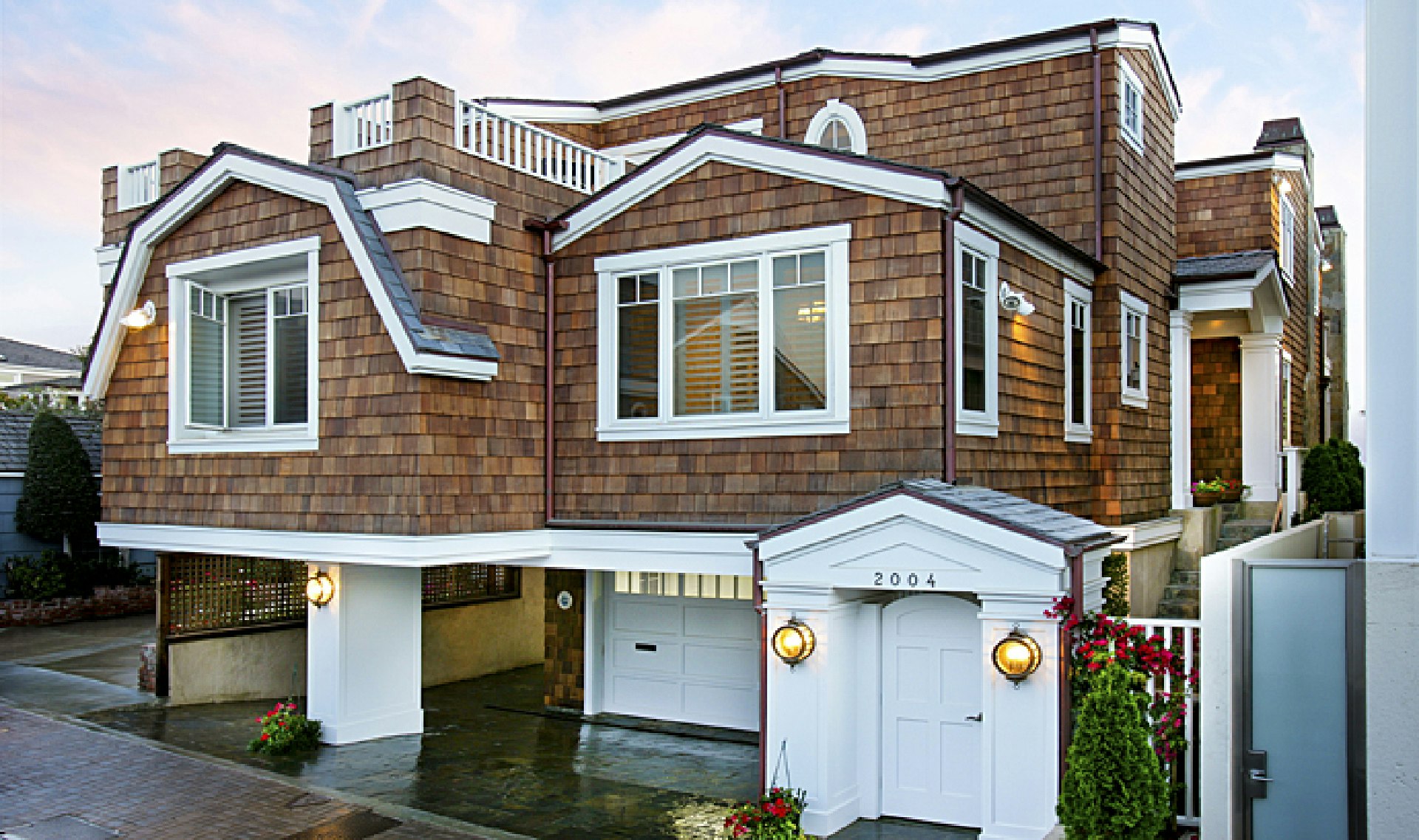 Cape Cod oceanfront architecture on the sand in Newport Beach