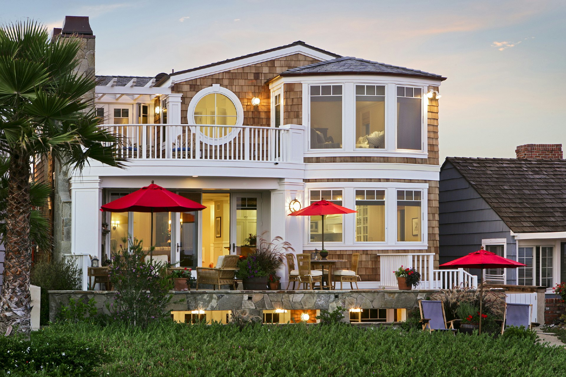 Cape Cod oceanfront architecture on the sand in Newport Beach