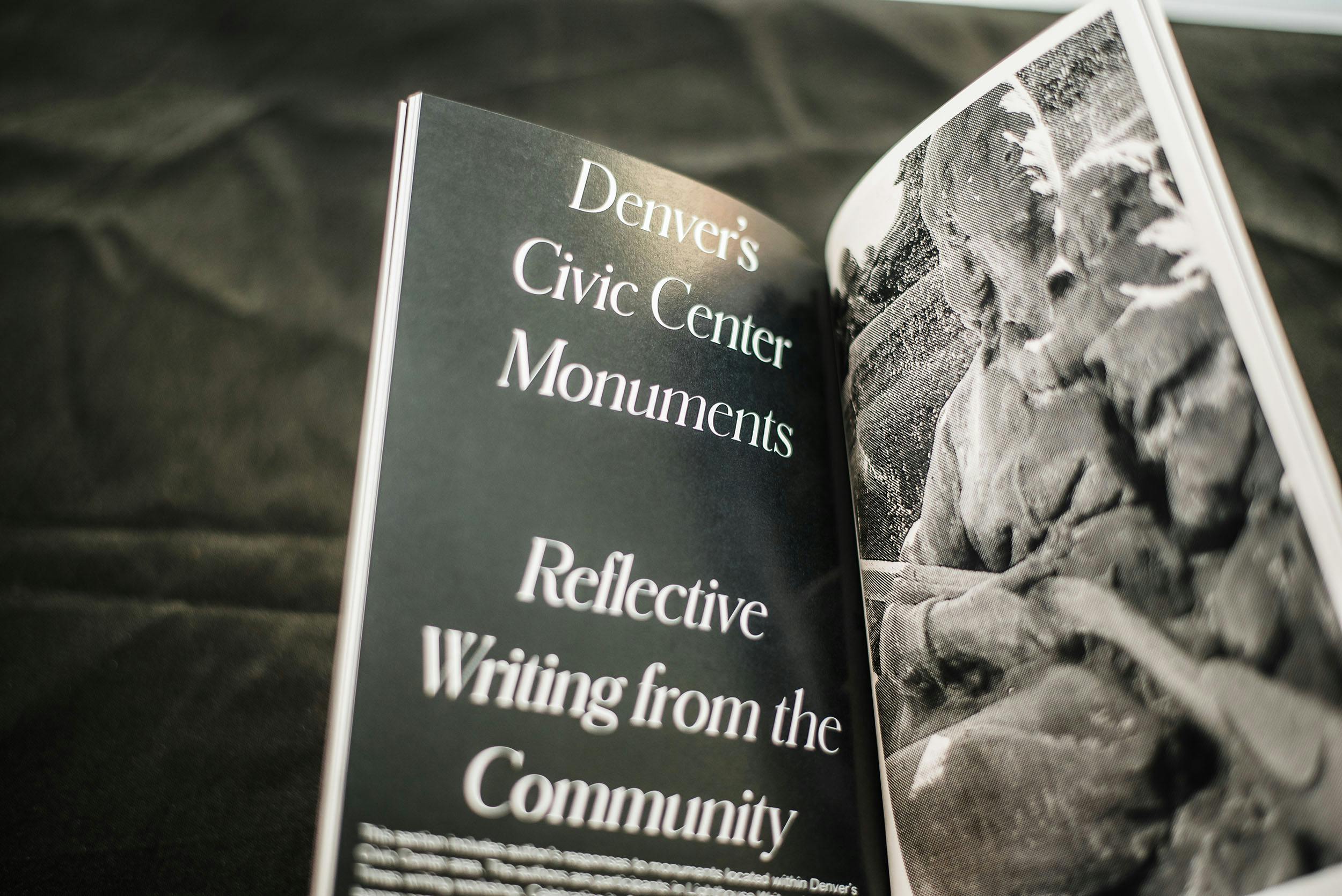 The MONUMENTAL zine featuring contributions from local artists and writers in Denver. Photo by From the Hip Photo.
