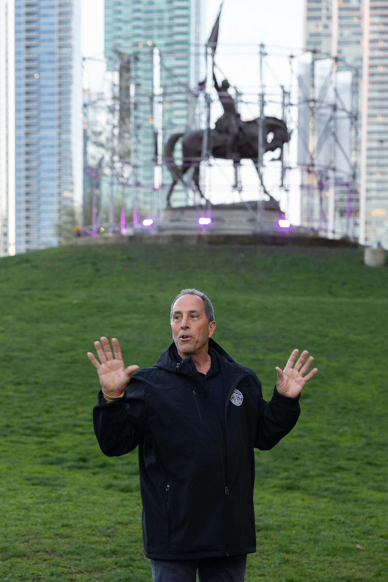 Mike Dimitroff, Manager of Art Initiatives at Chicago Park District, prior to the Evening Performance at Brendan Fernandes, "New Monuments | Chicago," 2024. General John Alexander Logan Monument, Grant Park, Chicago, IL. Presented by Black Cube Nomadic Art Museum in association with the Chicago Park District, as part of EXPO CHICAGO’s IN/SITU Outside program. Architectural Intervention by AIM Architecture. Courtesy the artist and Black Cube Nomadic Art Museum. Photos: Matthew Reeves Photography. 