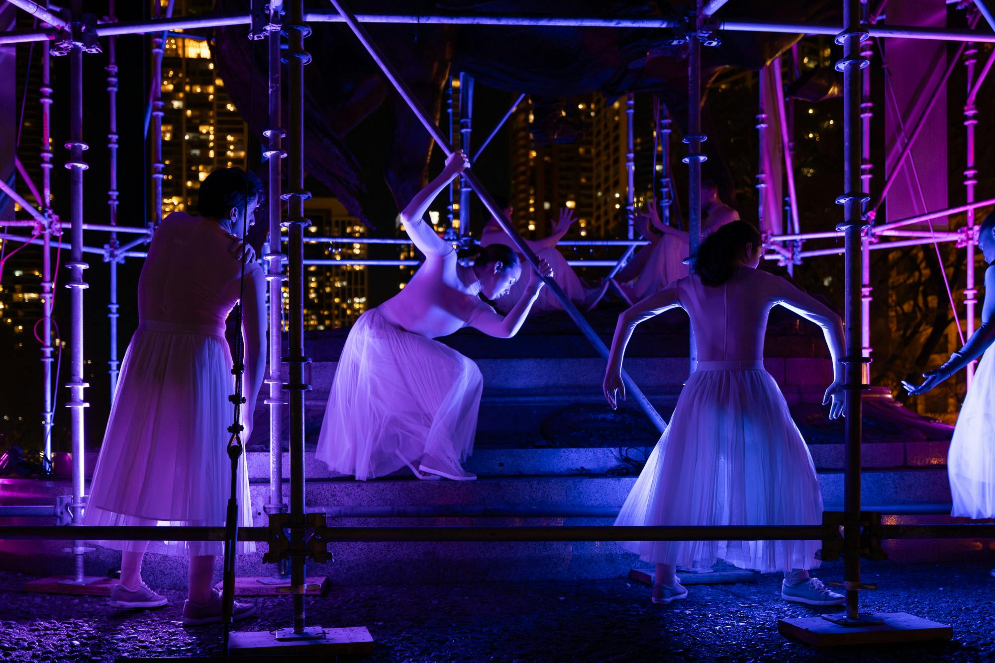 Evening Performance at Brendan Fernandes, "New Monuments | Chicago," 2024. General John Alexander Logan Monument, Grant Park, Chicago, IL. Presented by Black Cube Nomadic Art Museum in association with the Chicago Park District, as part of EXPO CHICAGO’s IN/SITU Outside program. Architectural Intervention by AIM Architecture. Dancers include Katlin Michael Bourgeois, Kara Hunsinger, Brian Martinez, Michelle Reid, Ashley Rivette, and Lieana Sherry. Courtesy the artist and Black Cube Nomadic Art Museum. Photo: Matthew Reeves Photography. 