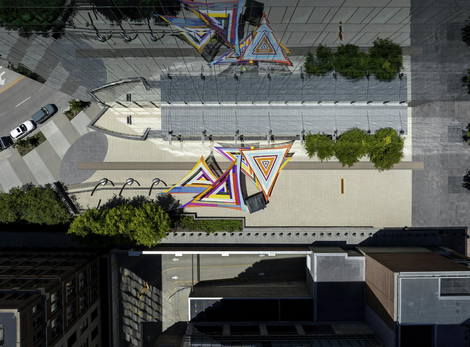 Rachel Hayes, Horizon Drift, 2024. Plaza of the Americas, Denver, Colorado. Site-specific installation composed of various industrial textiles, vinyl, and thread. Presented by the Biennial of the Americas with artistic direction by Black Cube Nomadic Art Museum. Courtesy the artist and Black Cube. Photo: Third Dune Productions. 