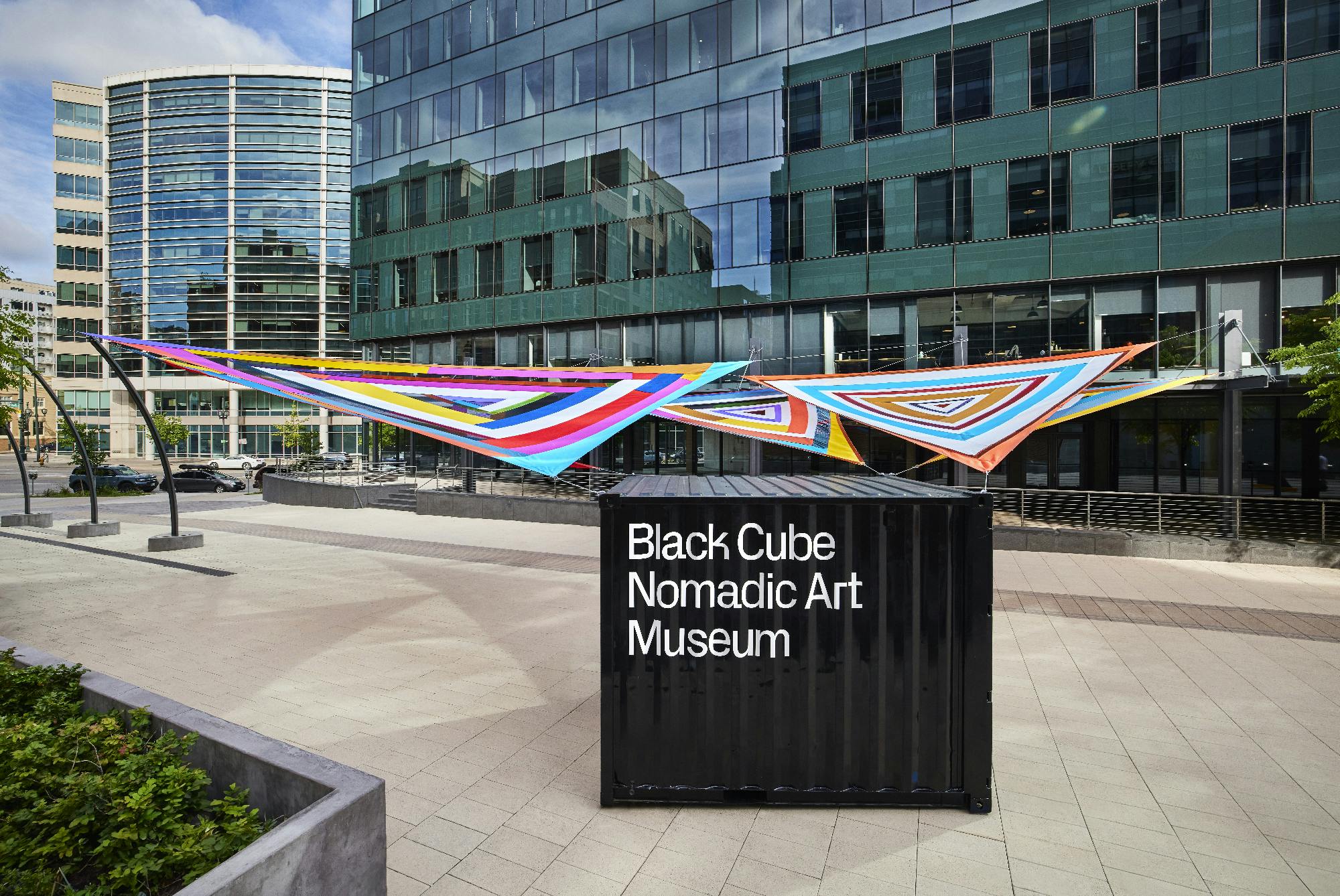 The Black Cube shipping container at Rachel Hayes, Horizon Drift, 2024. Plaza of the Americas, Denver, Colorado. Presented by the Biennial of the Americas with artistic direction from Black Cube. Courtesy the artist and Black Cube. Photo: Third Dune Productions.