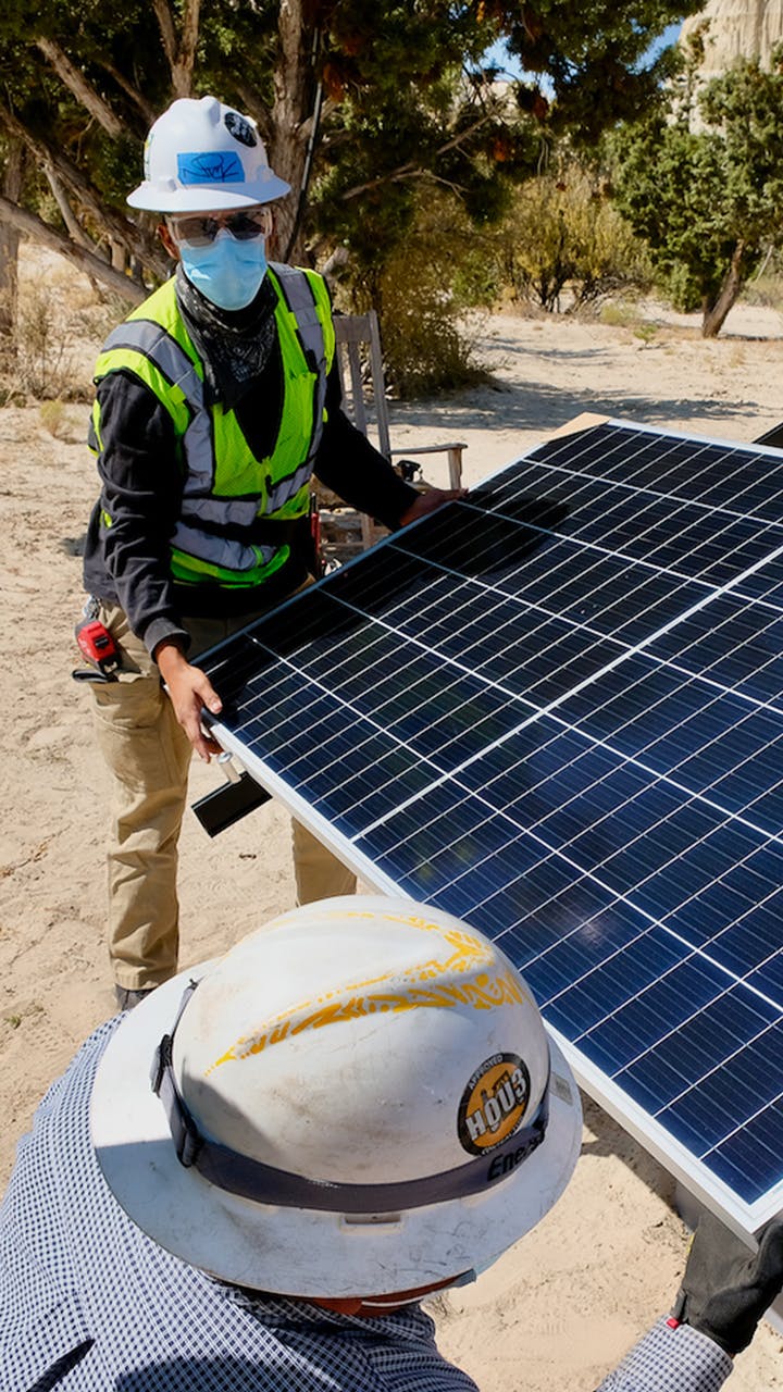 The Honnold Foundation installing solar panels.